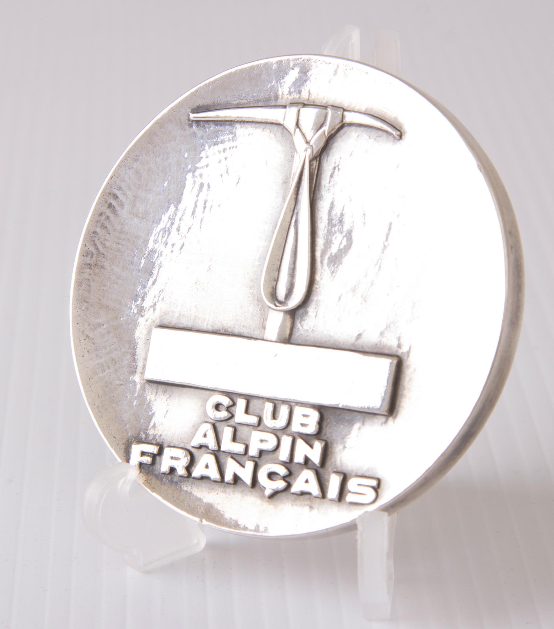 Art Deco silvered bronze Medal for Club Alpin Francais depicting a skier looking to the mountains.
signed Raymond Templier
Measures: H 7 cm, W 7 cm, D 1 cm
French, circa 1930.