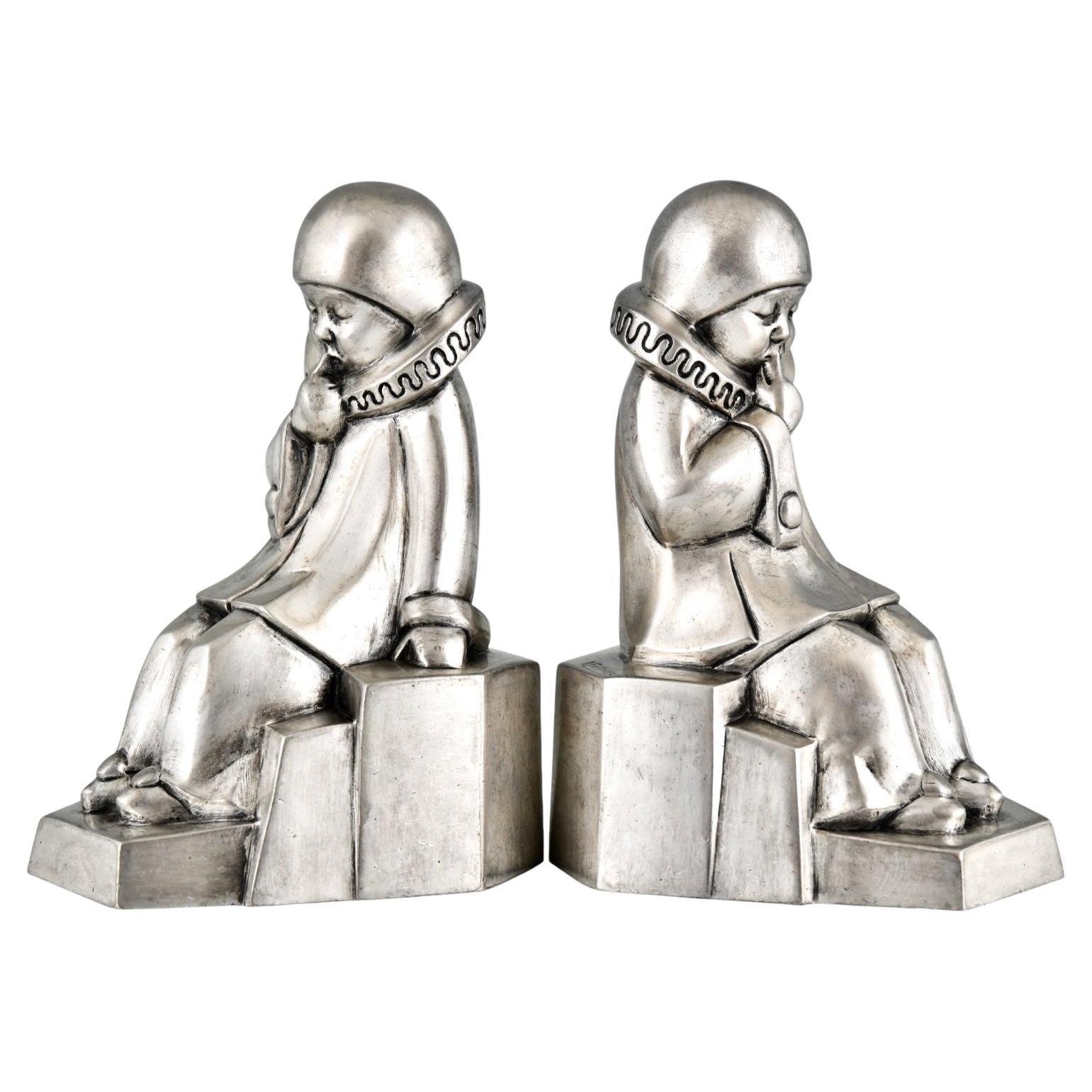 Versilberte Buchstützen aus Bronze mit Papageienmotiv im Art déco-Stil von Jean de la Fontinelle.