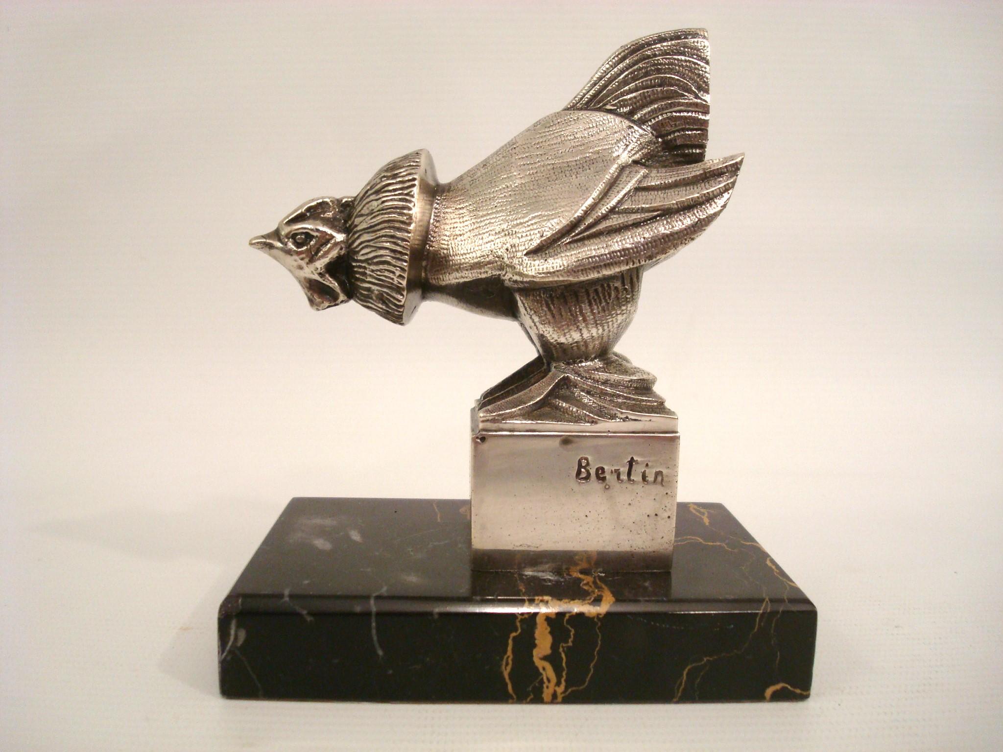 Art déco Serre-livres Art Déco en bronze argenté avec coq. France années 1920. en vente