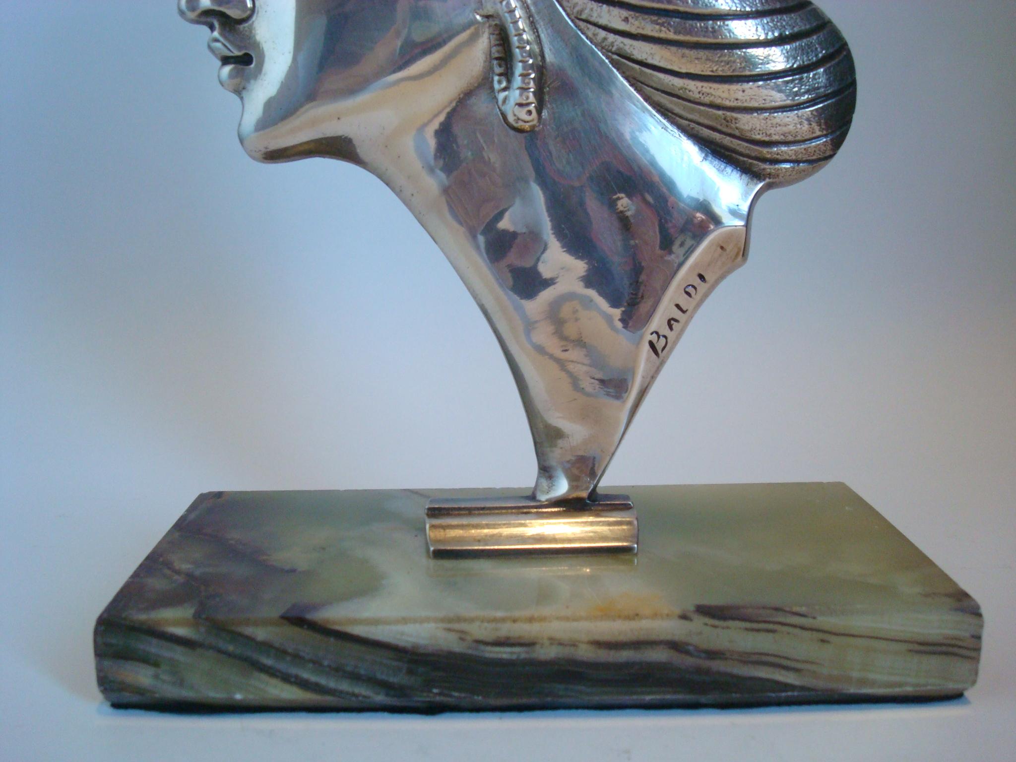 Art Deco Italian silvered plated bronze bust of a princess. She has a tiara. Sculpture is signed Baldi. Bust is mounted of a marble base. Perfect size sculpture for a desk or a side table.