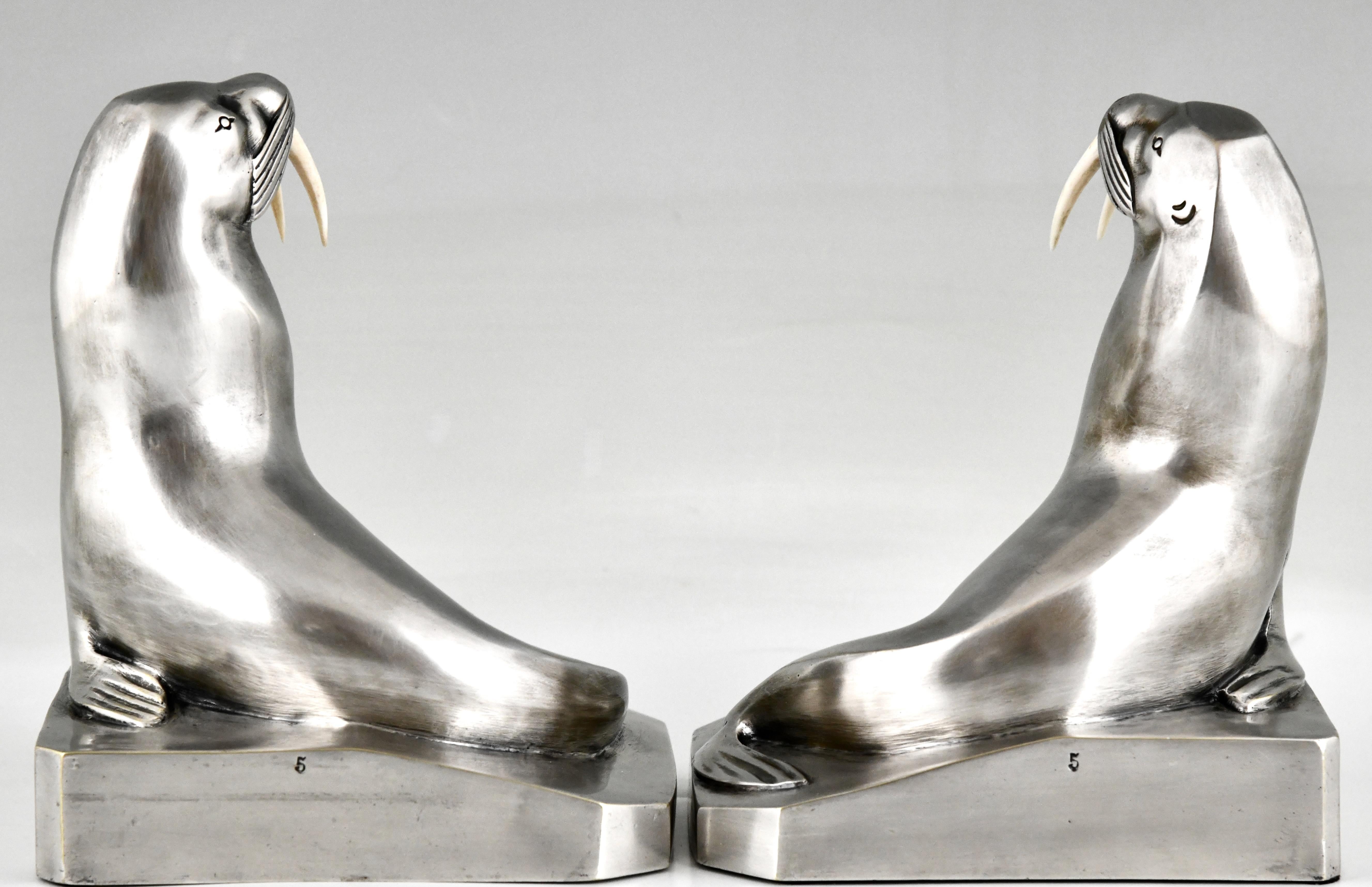 Art Deco silvered bronze walrus bookends signed by by G.H. Laurent.
Numbered, France 1925
This pair is illustrated in 2 books:
Art Deco and other figures by Brian Catley &
Statuettes of the Art Deco Period by Alberto Shayo.