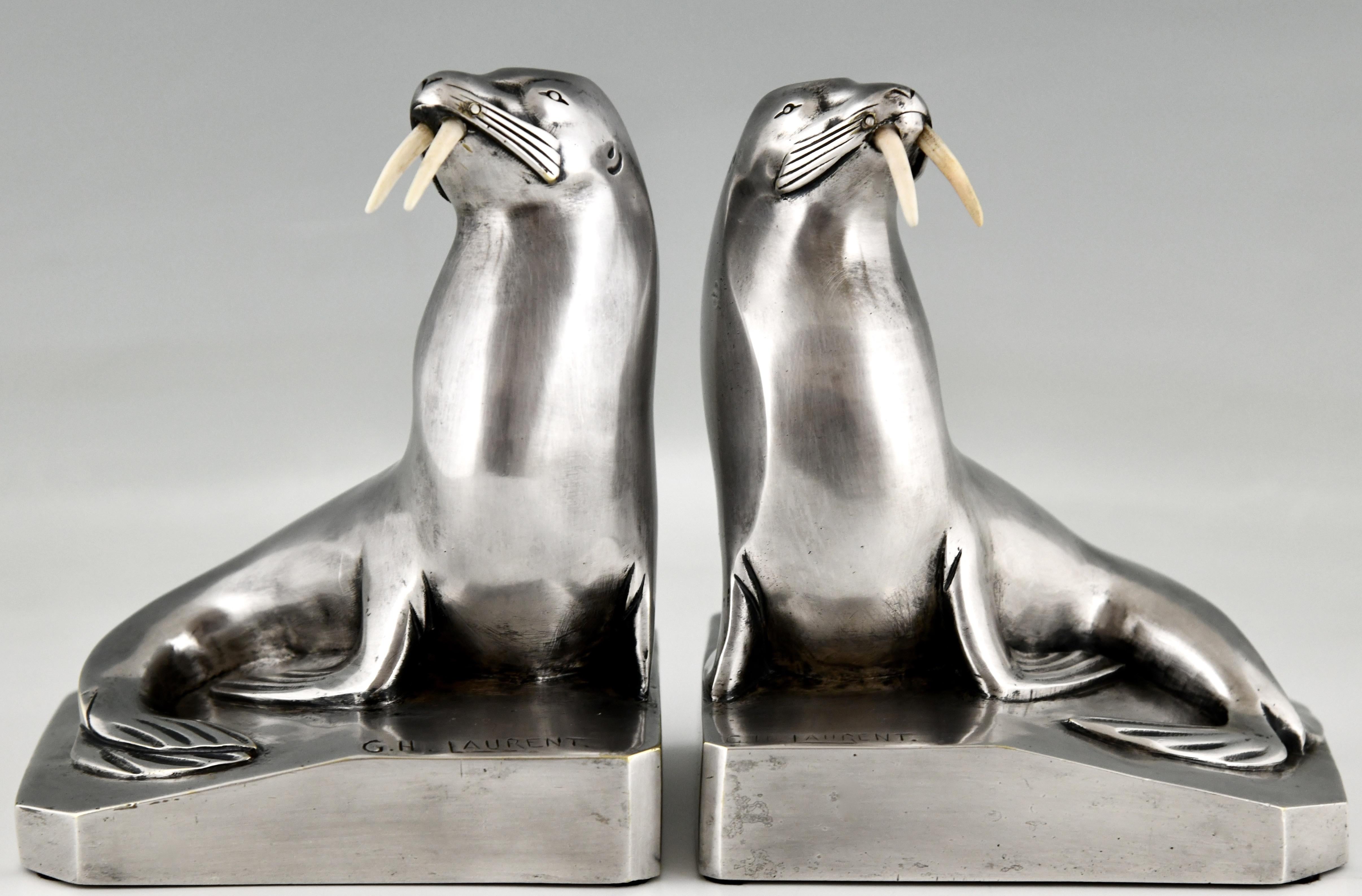 Art Deco silvered bronze walrus bookends signed by by G.H. Laurent. With the Les Neveux de Lehman Foundry mark. Numbered. France 1925 
This pair is illustrated in 2 books: 
Art deco and other figures by Brian Catley & 
Statuettes of the Art Deco