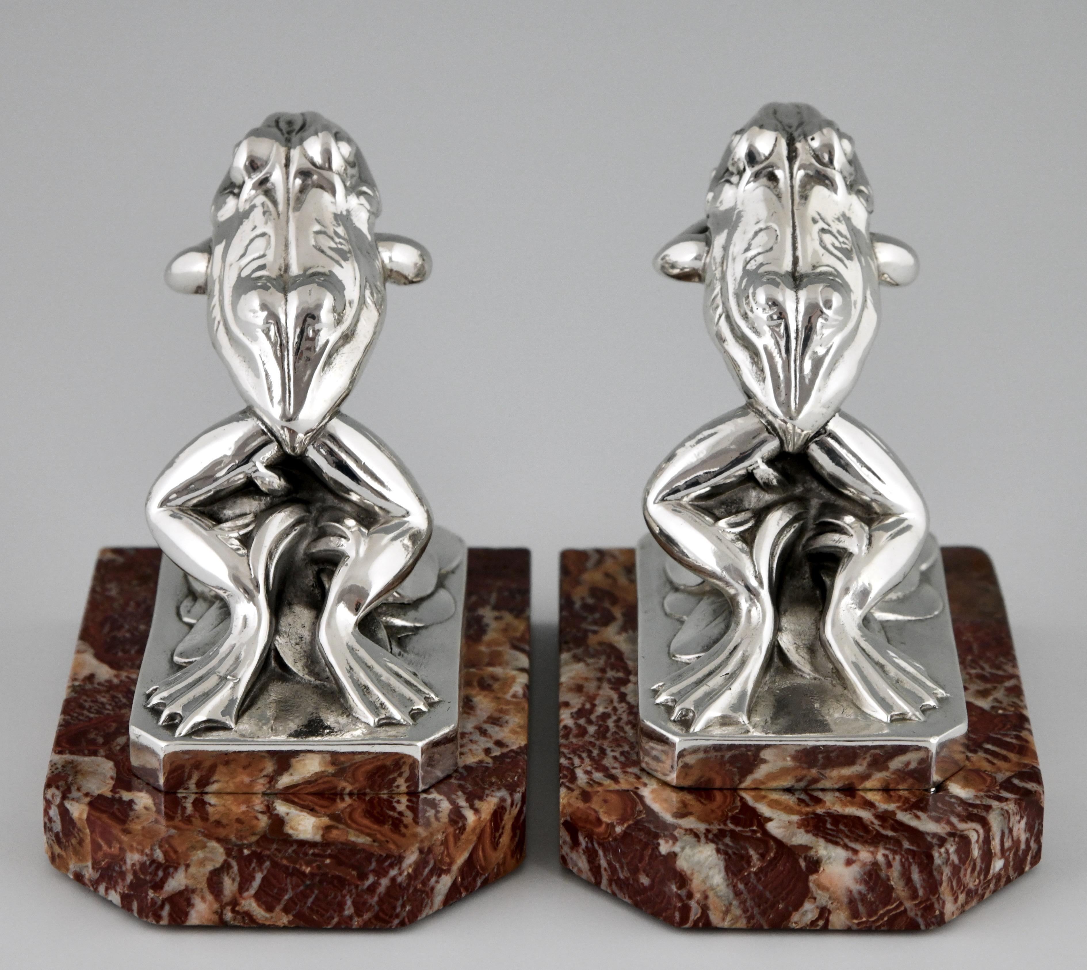 Silvered Art Deco silvered frog bookends by Maurice Frecourt. For Sale