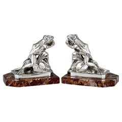 Vintage Art Deco silvered frog bookends by Maurice Frecourt.