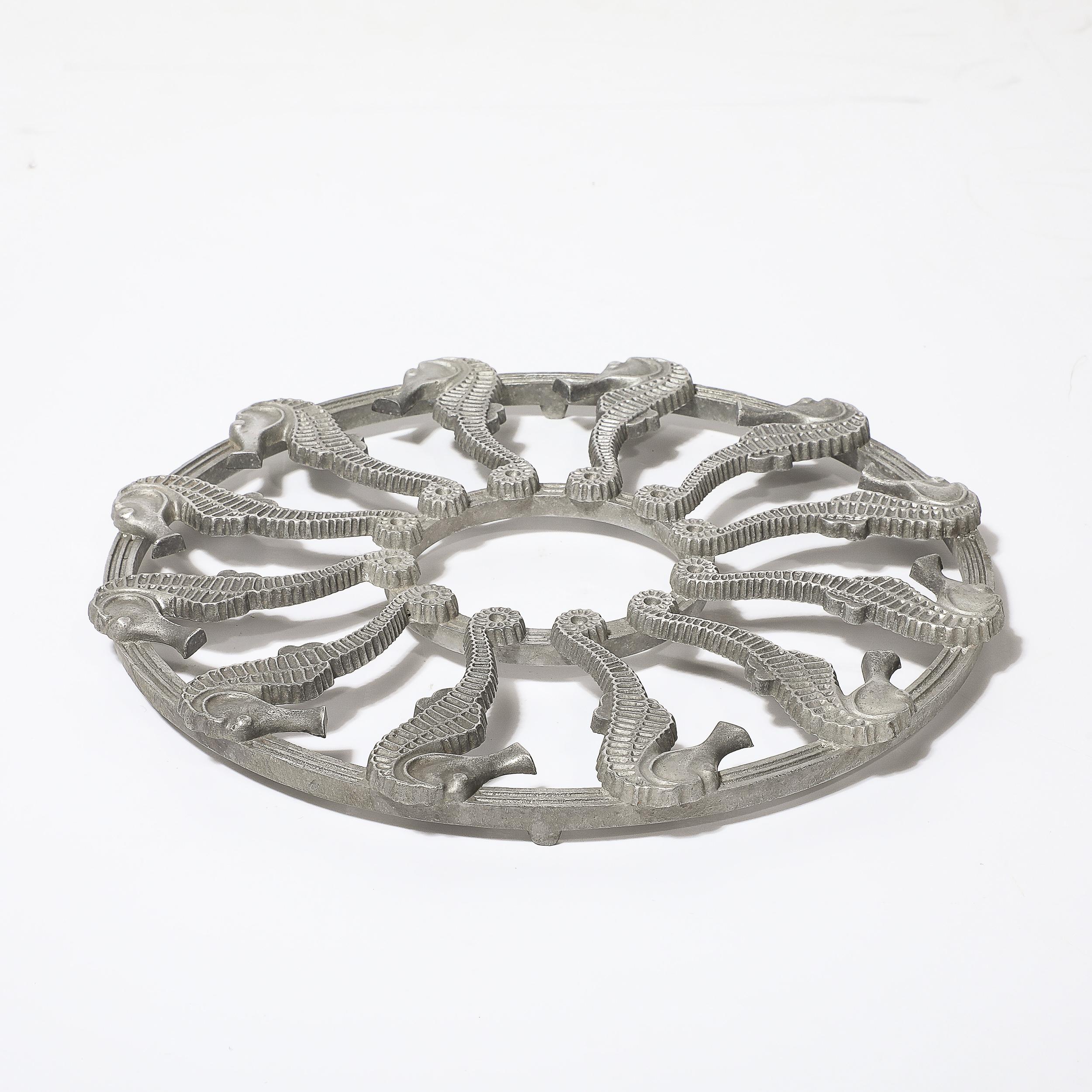 This striking and beautifully formed Art Deco Silvered Metal Seahorse Trivet signed Grand Rapids Casting Co. originates from the United States, Circa 1930. Features a round composition of seahorses with beautiful sculptural forms and detailing.