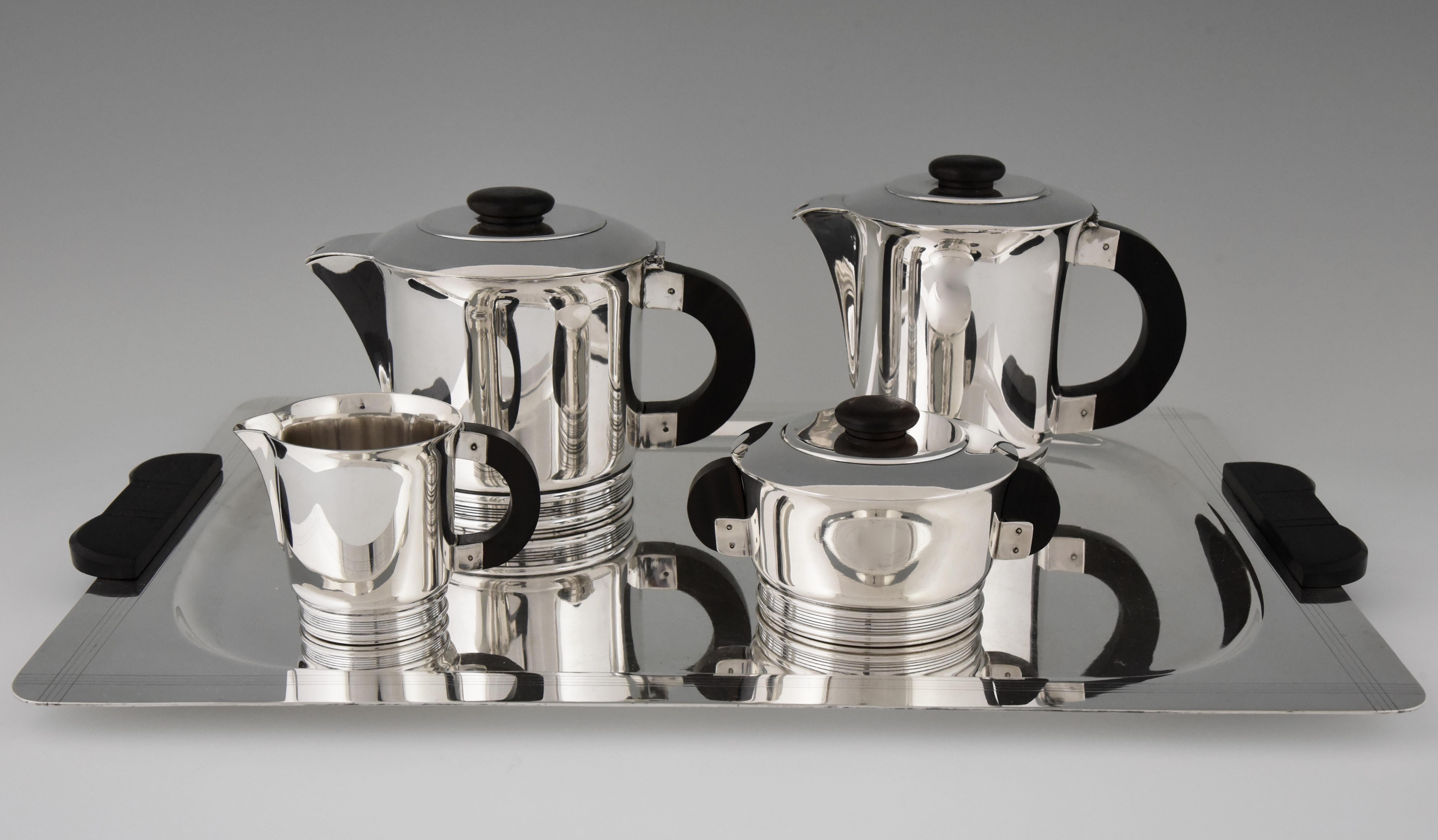 Beautiful design and very good quality Art Deco silvered coffee and tea set by Ercuis, France, circa 1925-1930.
 