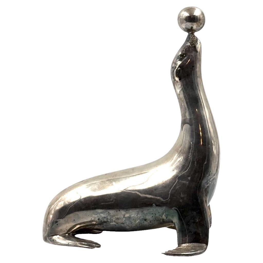Art deco silverplated brass Seal sculpture, France 1940s