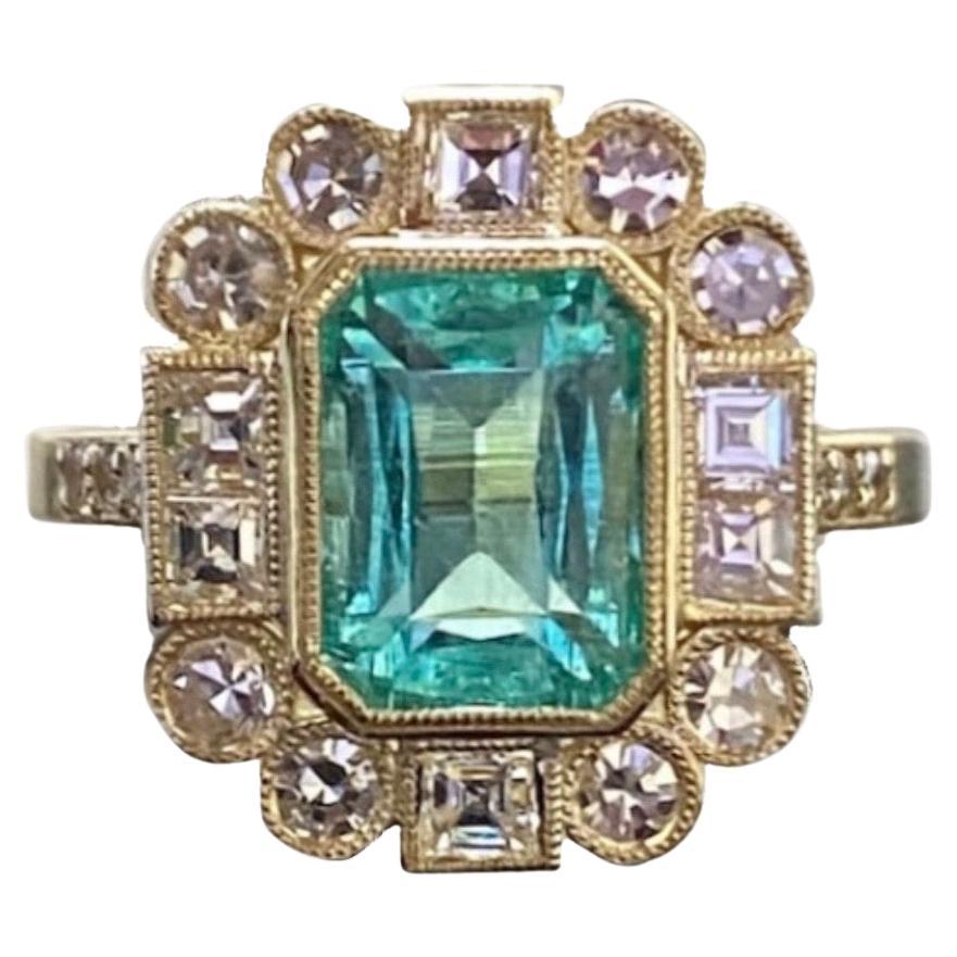 DeKara Designs Classic

Handmade Art Deco Oval Emerald and Diamond Ring.

Metal- 14K Yellow Gold, .583

Stones- GIA Certified Elongated Octagonal Colombian Emerald 1.99 Carats, 14 Single Cut Round Diamonds G-H Color VS2-SI1 Clarity 0.52 Carats, 6