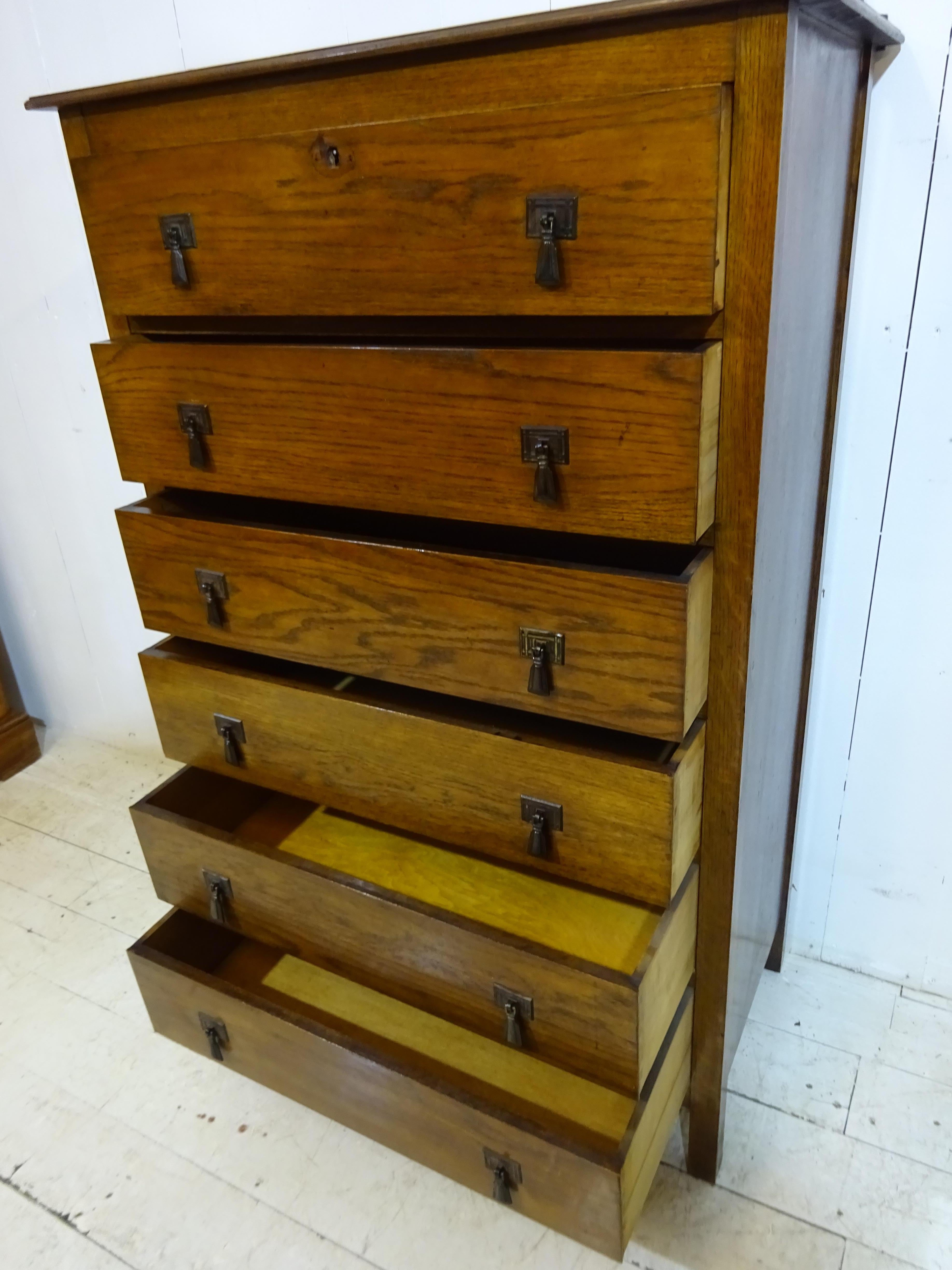 Chest of Drawers 

A lovely, six drawer chest of drawers circa 1920. 

Great look and proportions and an ideal addition to almost any room. 

This is an original Art Deco chest of drawers. The frame is oak with solid well made joints. Each
