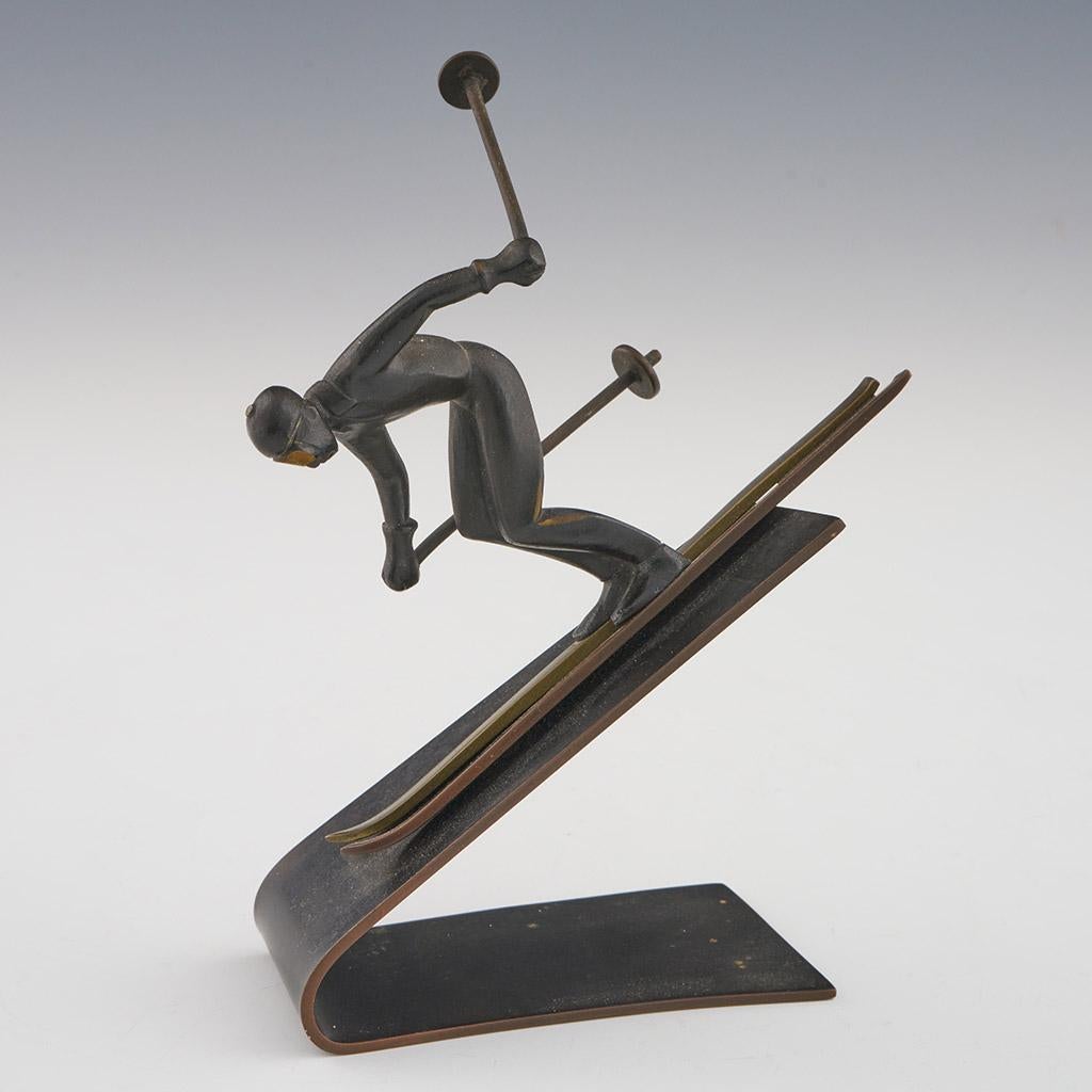 A downhill skier in bronze by Richard Rohac. Stamped to underside. 

Dimensions: H 14cm W 9.5cm D 4cm

Origin: Austrian

Date: Circa 1930

Item Number: 2102243