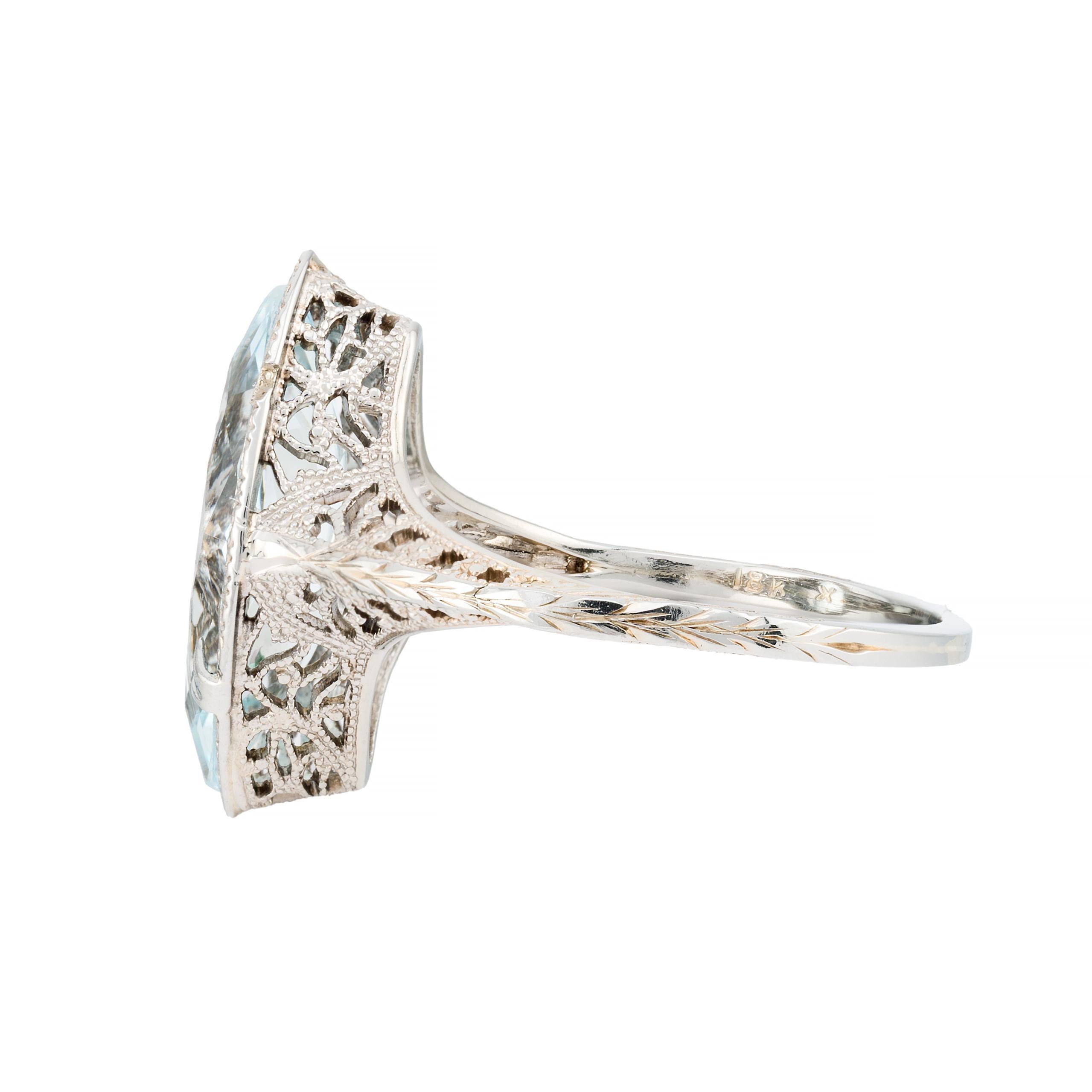 Aston Estate Jewelry Presents:

An exquisite ring featuring a 2.25 carat marquise cut aquamarine of beautiful sky blue color. The center stone is elegantly set within a detailed openwork design.

Crafted in 18k white gold, the ring showcases a