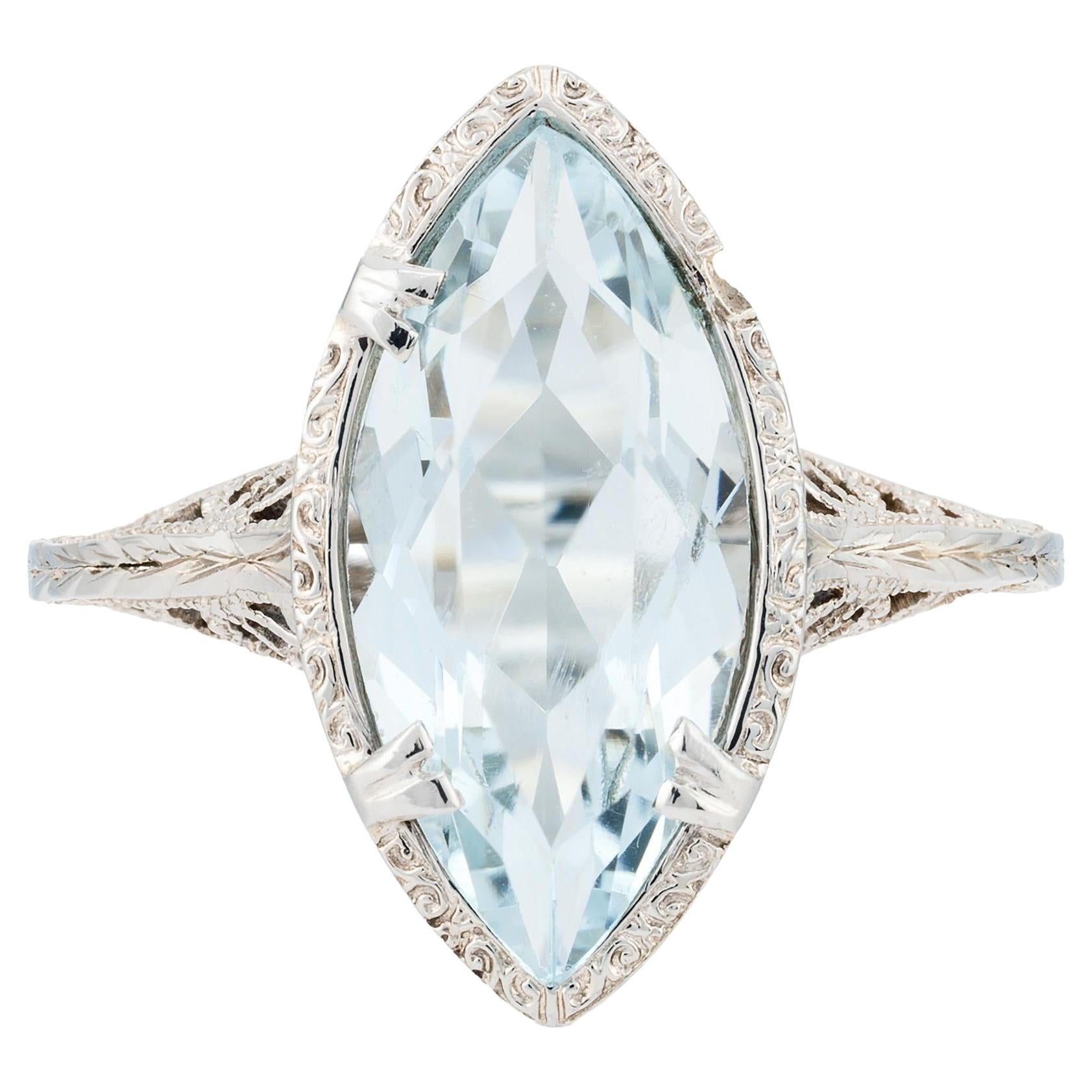 Art Deco Sky Blue Aquamarine Solitaire Filigree Ring in 18 Karat White Gold For Sale