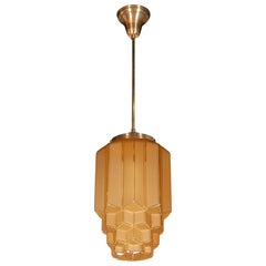 Art Deco Skyscraper Style Faceted Pendant in Frosted and Translucent Amber Glass
