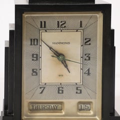 Reloj eléctrico Hammond de baquelita, estilo rascacielos Art Déco, con función de día y fecha
