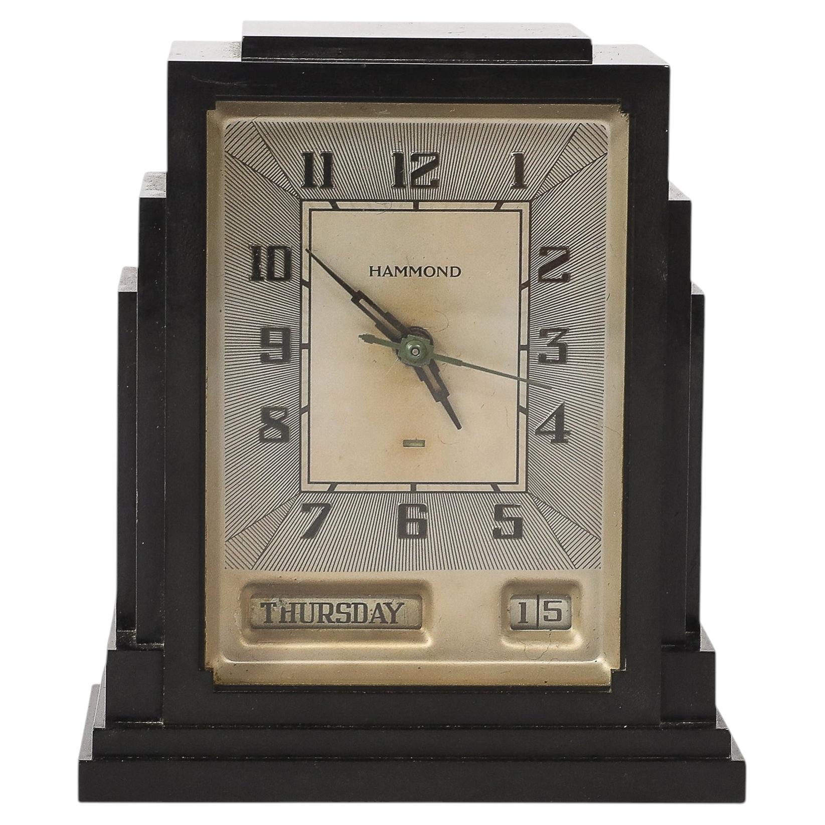 How do I program an Arne Jacobsen Roman table clock?
