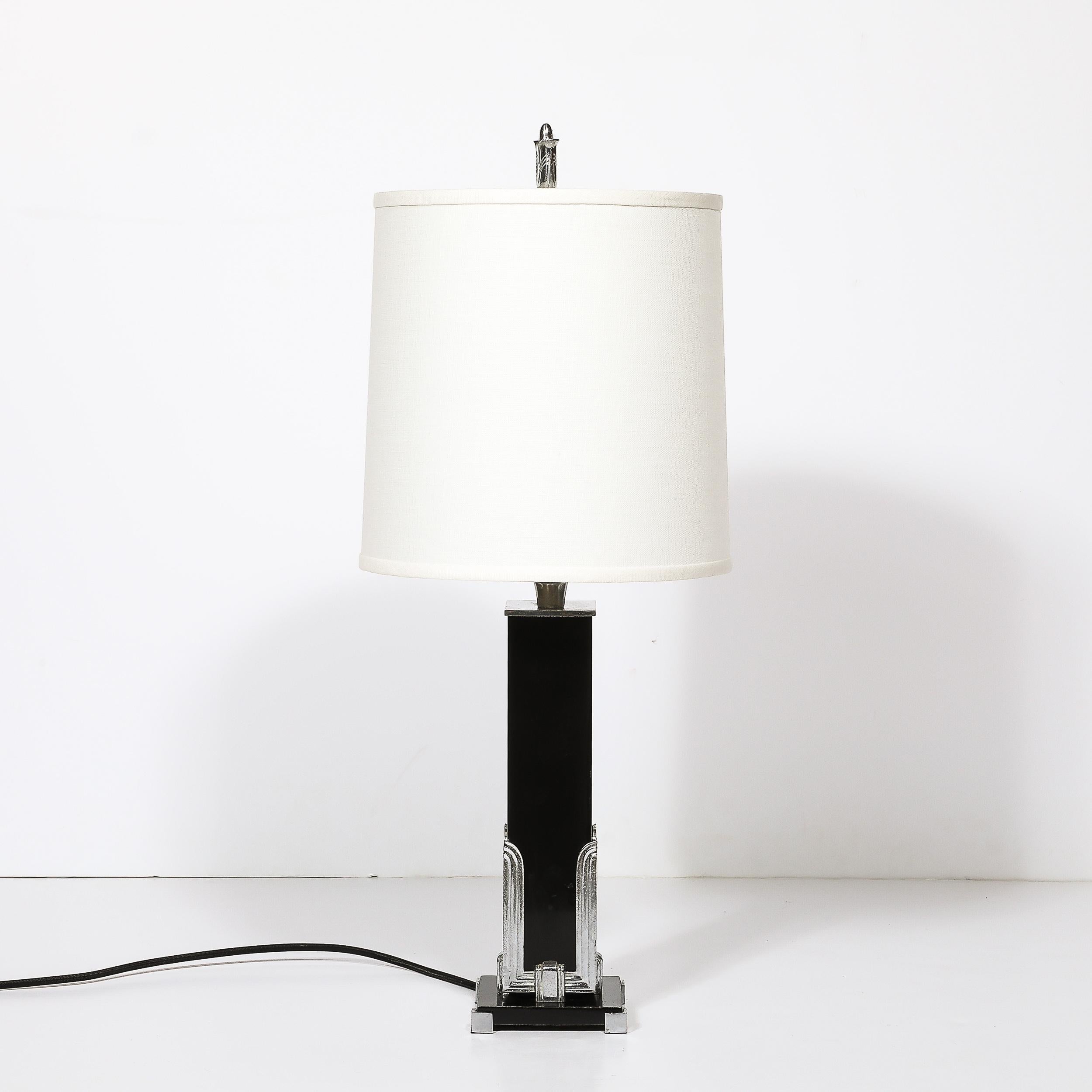 This elegant and classically formed Art Deco Skyscraper Style Table Lamp in Black Enamel & Chrome Fittings originates from the United States, Circa 1935. Featuring a rectangular body in black enamel, framed by fluted chrome skyscraper style