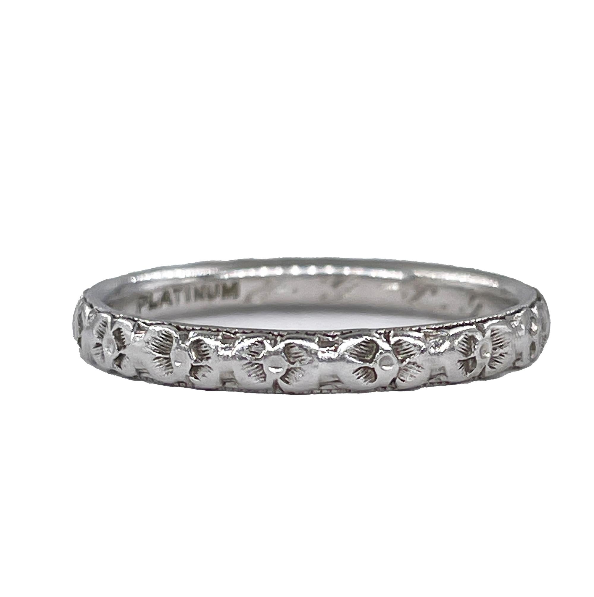 Antique sleekly thin Vintage Art Deco Wedding Band Platinum Ring
About as delicate as they come, dating from the Art Deco period, 1928, this slim wedding band, hand-fabricated in platinum with exquisite design across the this  slender and precious