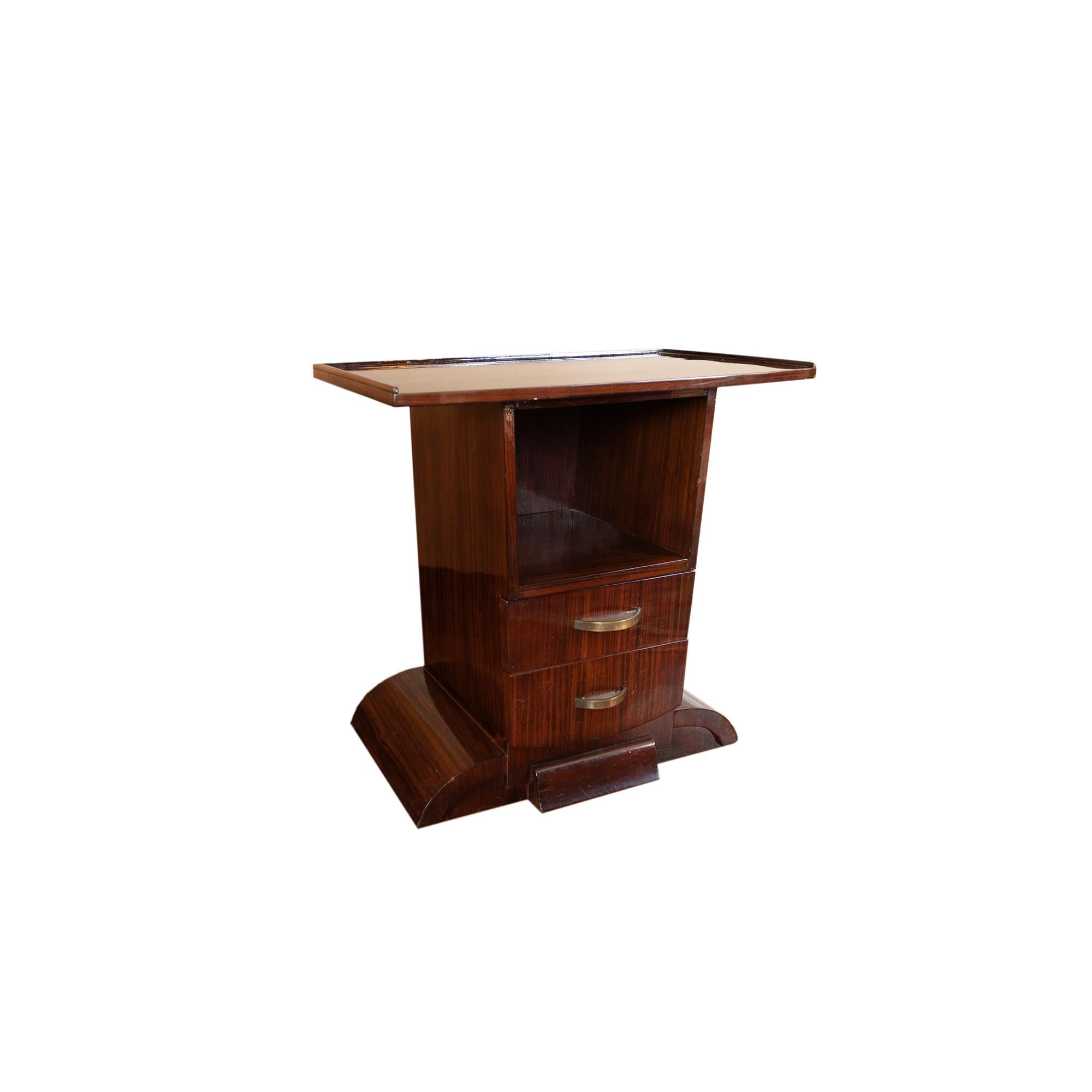 A refined French Art Deco small console table or bed side table in walnut veneer from the 1930s, featuring a compact design with two drawers and an open compartment for versatile storage.

This piece embodies the sleek sophistication of the Art Deco