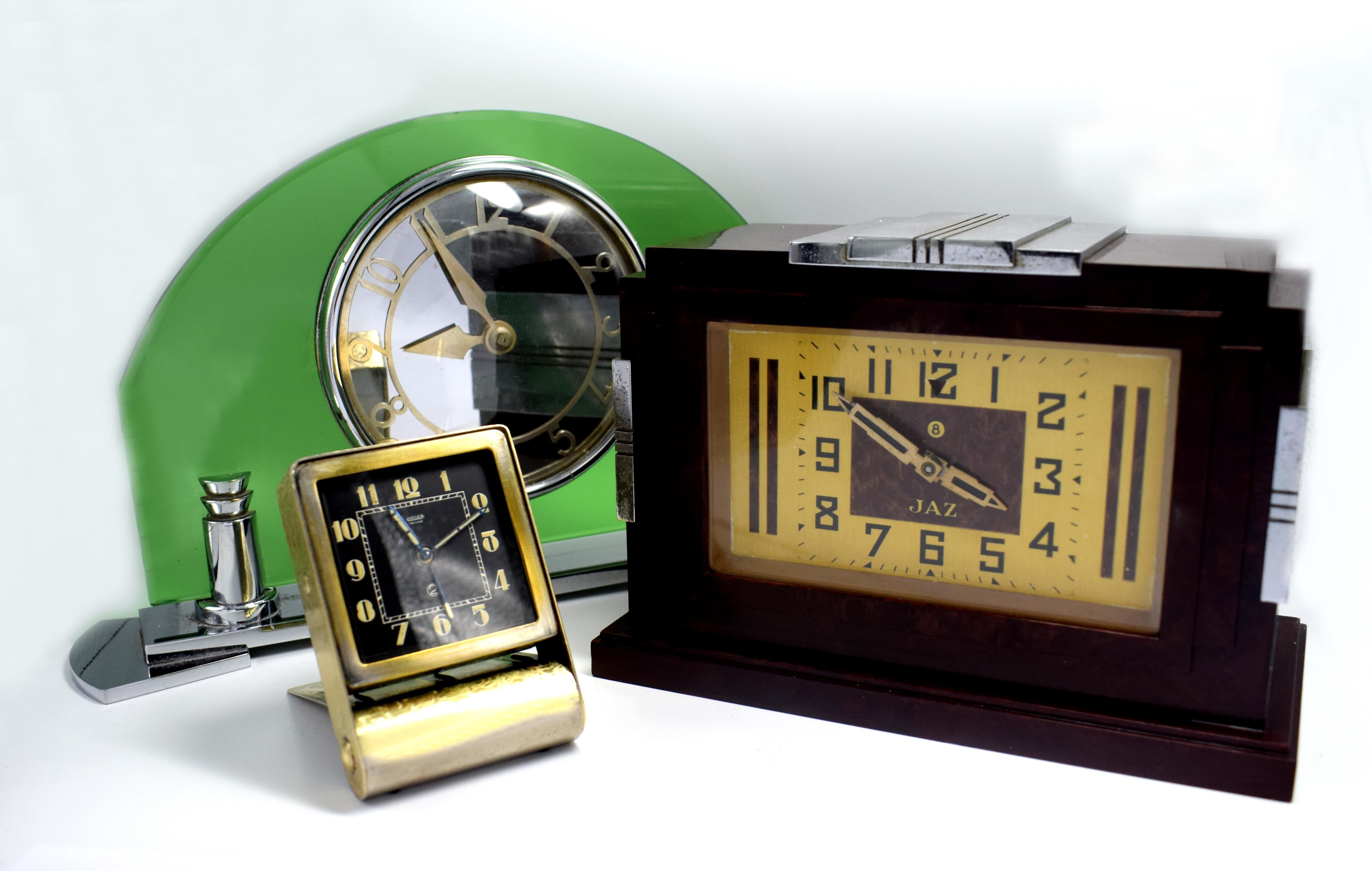 20th Century Art Deco Smiths English 8 Day Chrome and Green Glass Clock, circa 1930