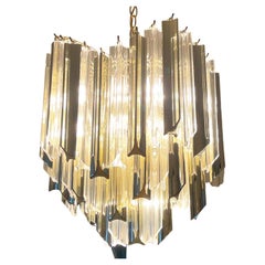 Lustre Art Déco en or fumé et lucite transparente