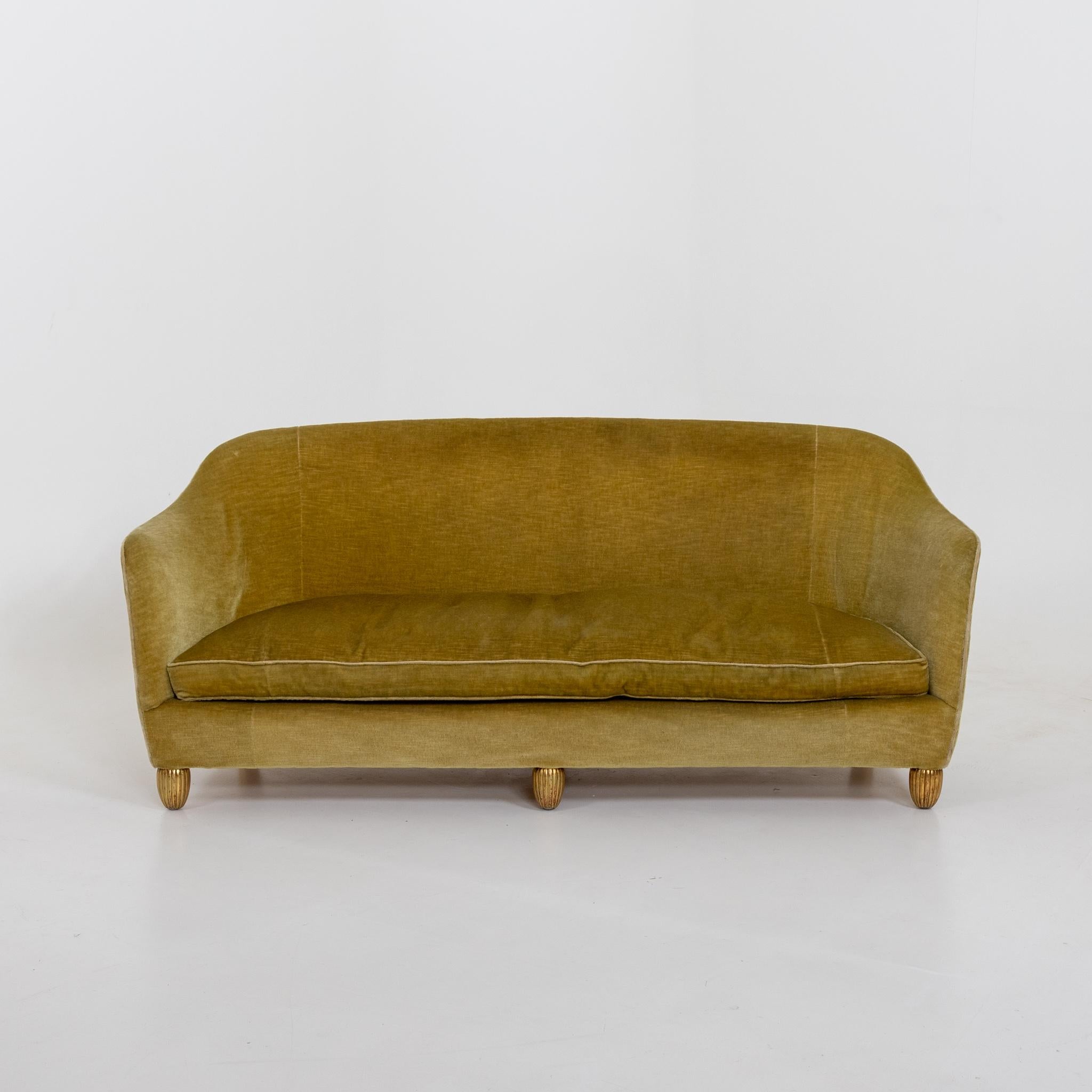 Art Deco sofa by Maison Franck. Frame in original upholstery standing on fluted giltwood feet. Originally ordered in 1938 by Romi Goldmuntz ,owner of a important diamond company in Antwerp, Belgium. This suite of furniture along with a desk and