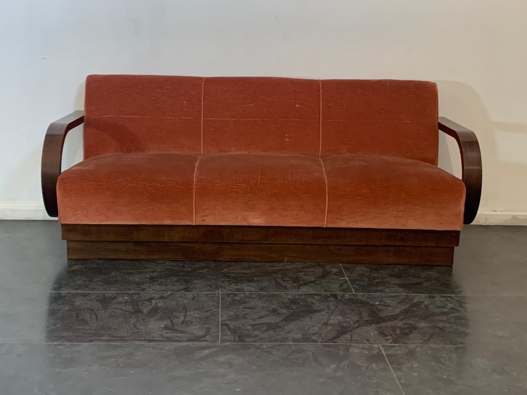 Art Deco fabric and oak sofa with arched arms.