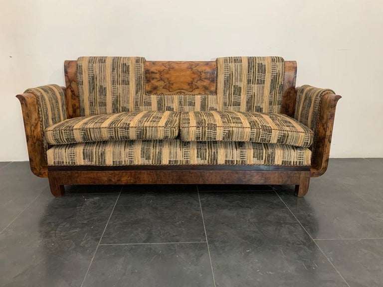 Art Deco walnut-root and flared glass sofa by Franco Albini produced in the 1930s. Light wear and patina due to age and use. It presents a halo on the fabric.

Packaging with bubble wrap and cardboard boxes is included. If the wooden packaging is