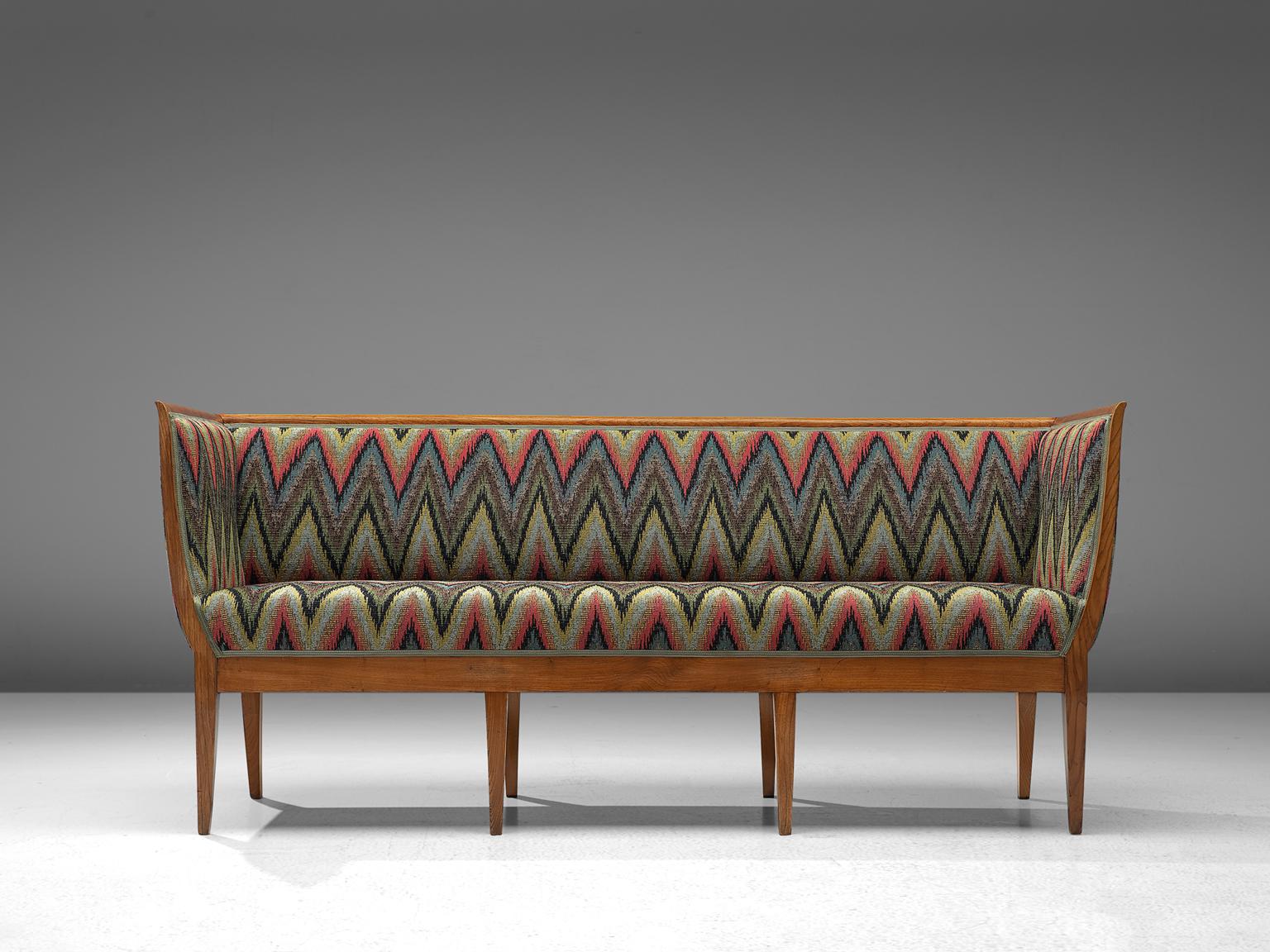 Art Deco sofa, fabric and oak, Scandinavia, 1940s.

This Classic sofa is executing with an oak frame and a luxurious, contemporary fabric upholstery. The design is well balanced, showing an interesting contrast between the straight lines of the