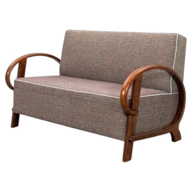Art Deco Sofa with Sculptural Walnut Arms, circa 1920s–1930s