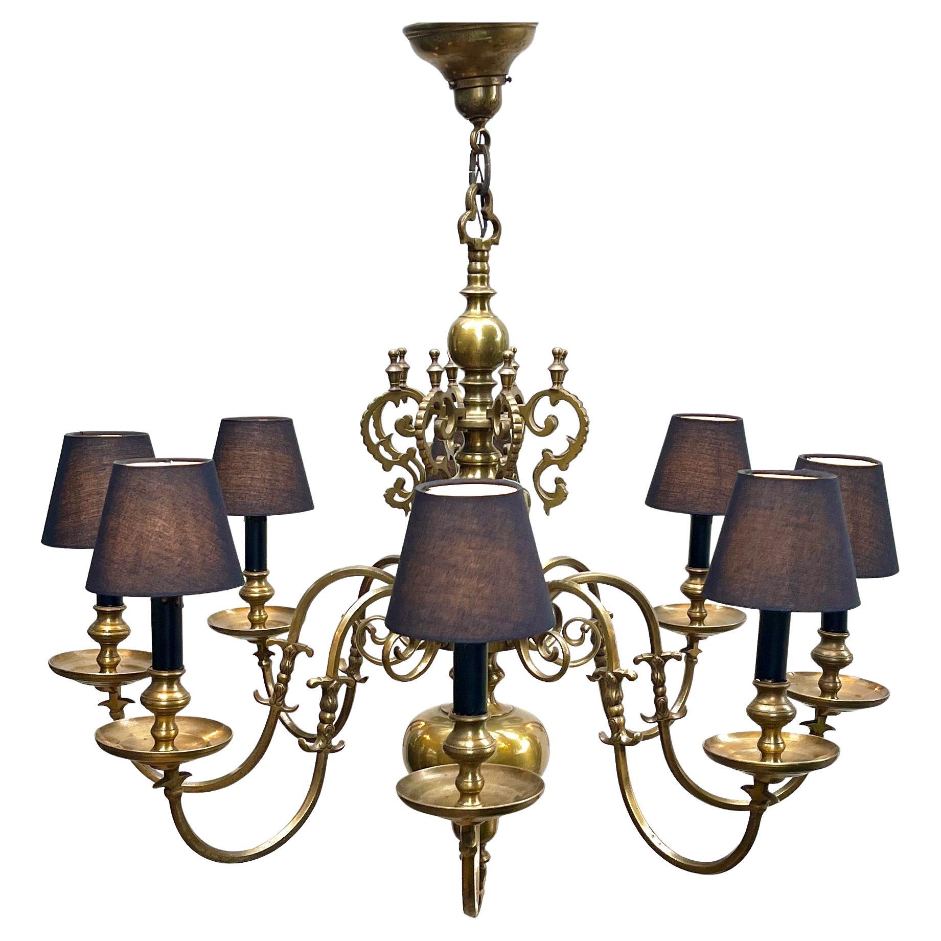 Art Deco chandelier pendant with 9 mounts of solid brass, 

In good condition and in full working order. Fitting E14. 
Fitted with a screw terminal block.
with original patina on solid brass 
Photography fails to capture the simple elegant