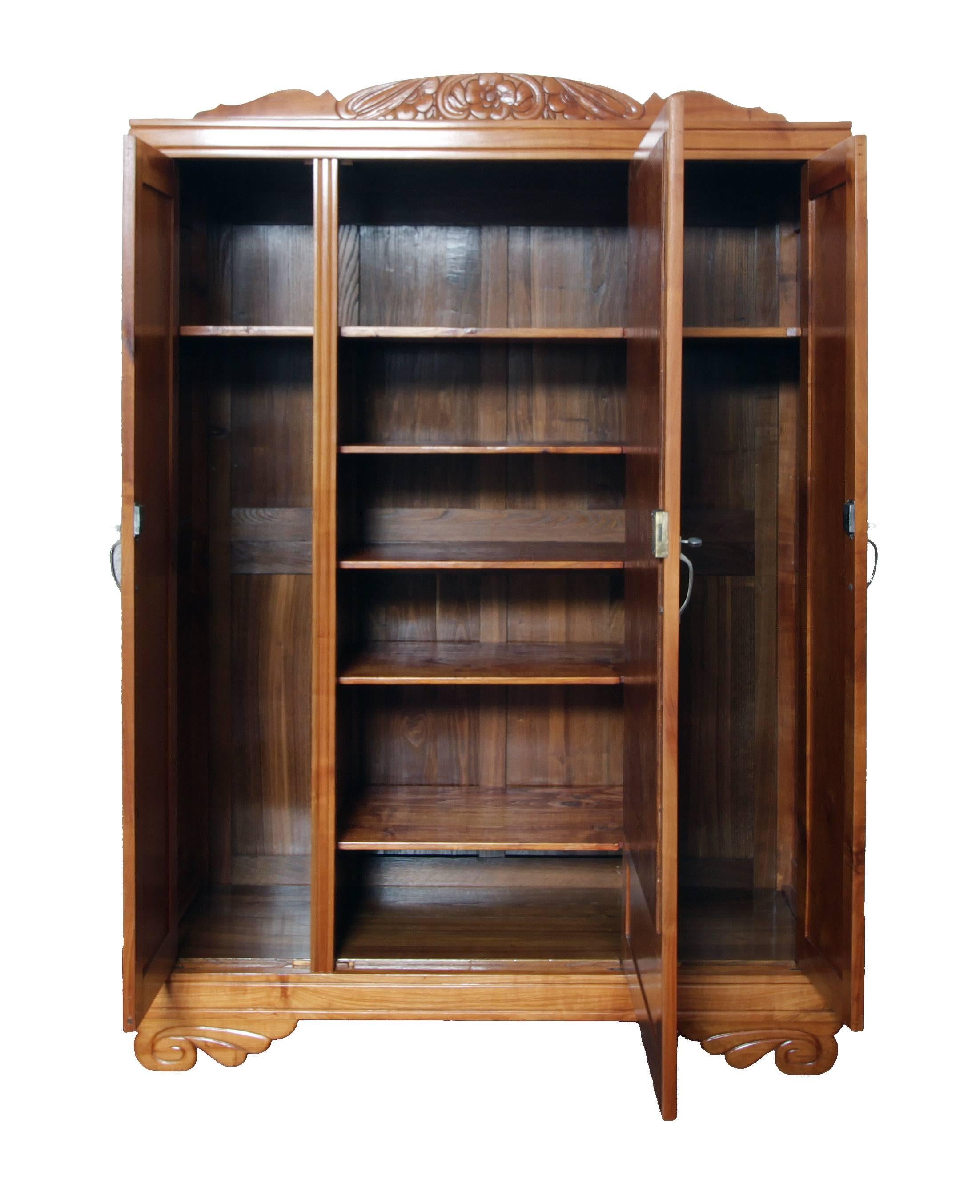 The Art Deco cabinet from circa 1920 from Germany was made in solid cherrywood.
The cabinet can be disassembled and shipped disassembled. The cabinet consists of:
Lower part, upper part, three doors, two side parts, the rear wall and several