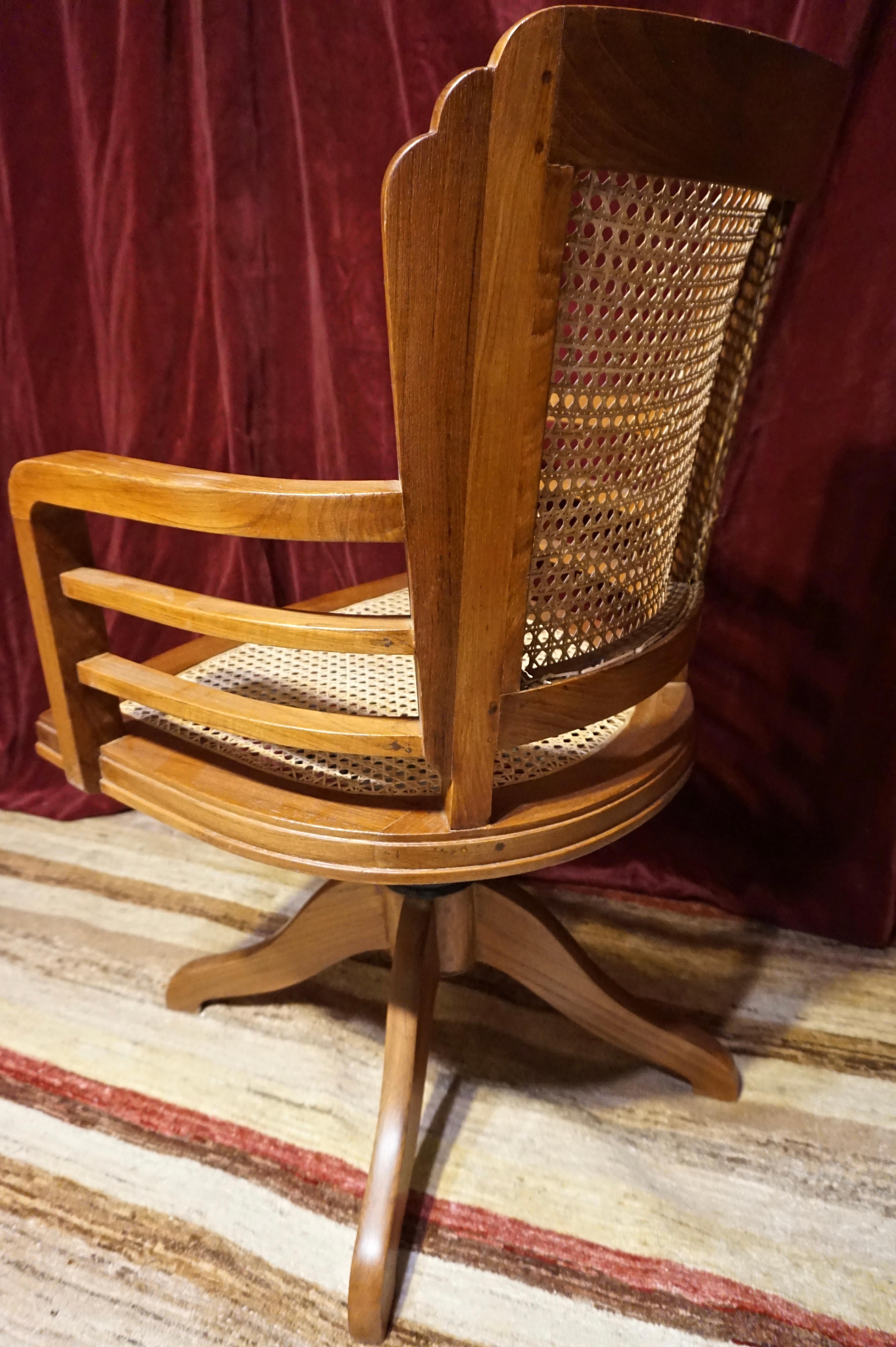 British Indian Ocean Territory Art Deco Solid Teak Revolving Chair with Cane Work & Solid Armrests