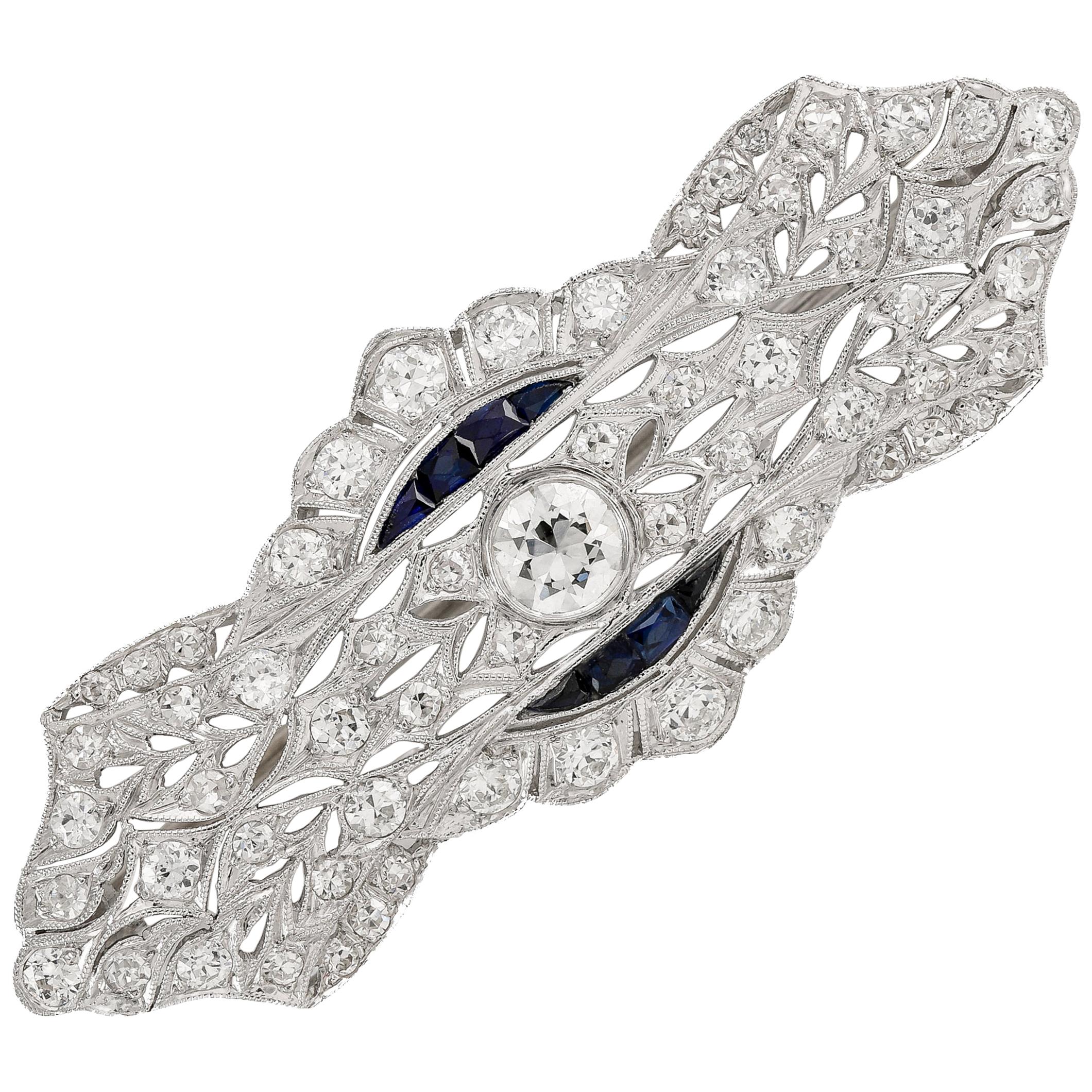 Art Deco Solitaire Diamond Calibre Cut Sapphire Brooch, circa 1925 For Sale