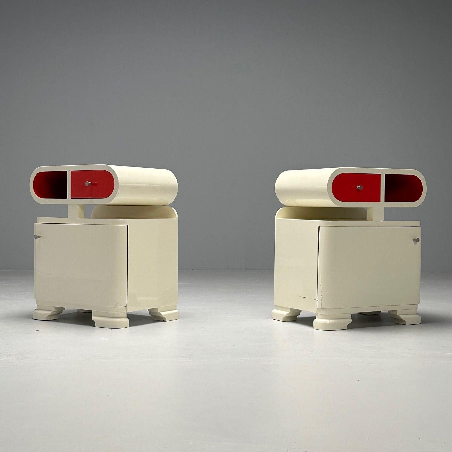 Pair of Art Deco Nightstands / End Tables, White and Candy Apple Red Lacquer, Space Age Modern Style

Pair of R2D2 Art Deco nightstands, side tables, or end tables in white and red lacquer. Both pieces offer ample storage with the top having one