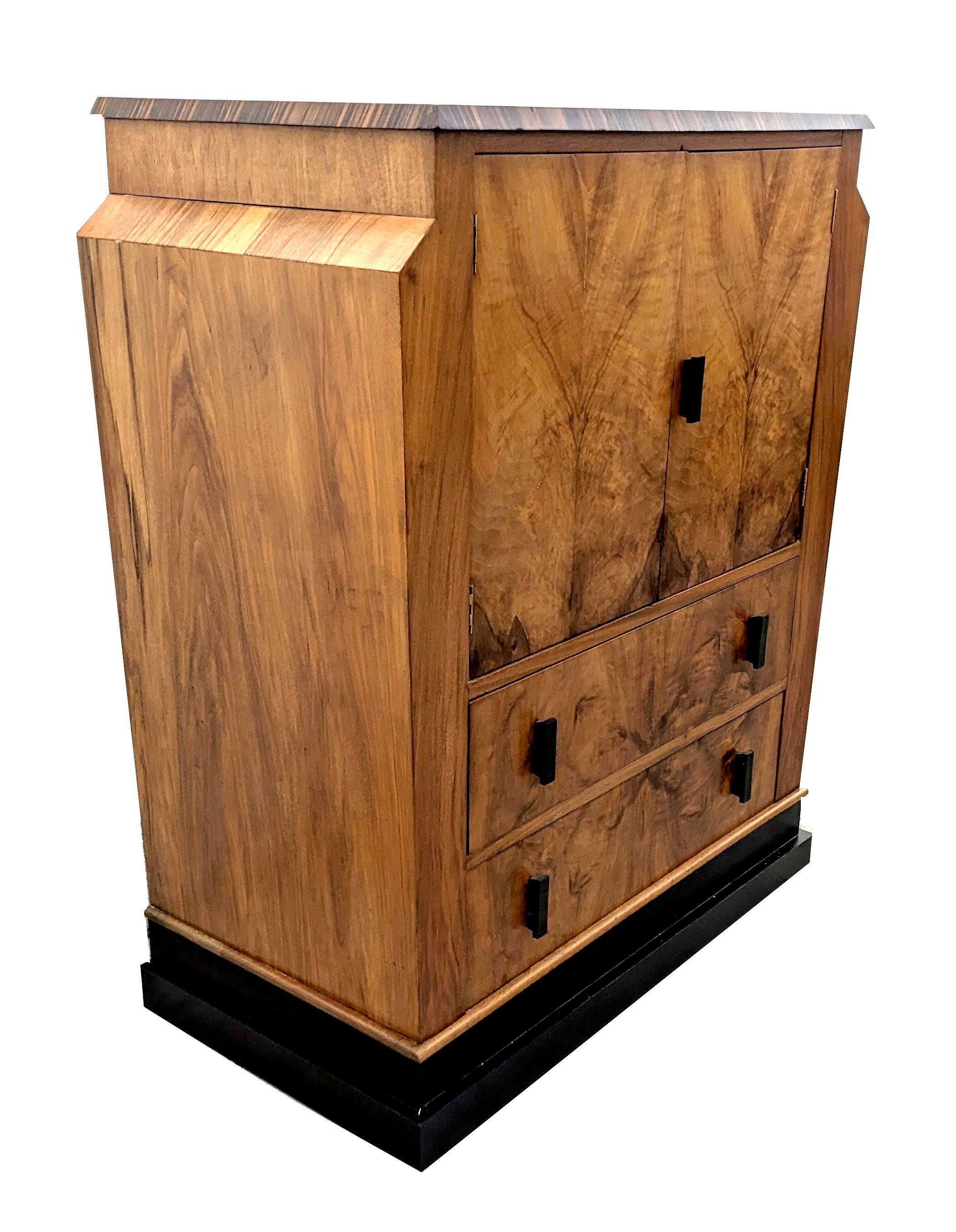 For those who collect Art Deco will know how hard it is to source genuinely good quality unique pieces that are iconic in style of this wonderful bygone era. For your consideration is this fabulous Art Deco Walnut tallboy dating to the 1930's.