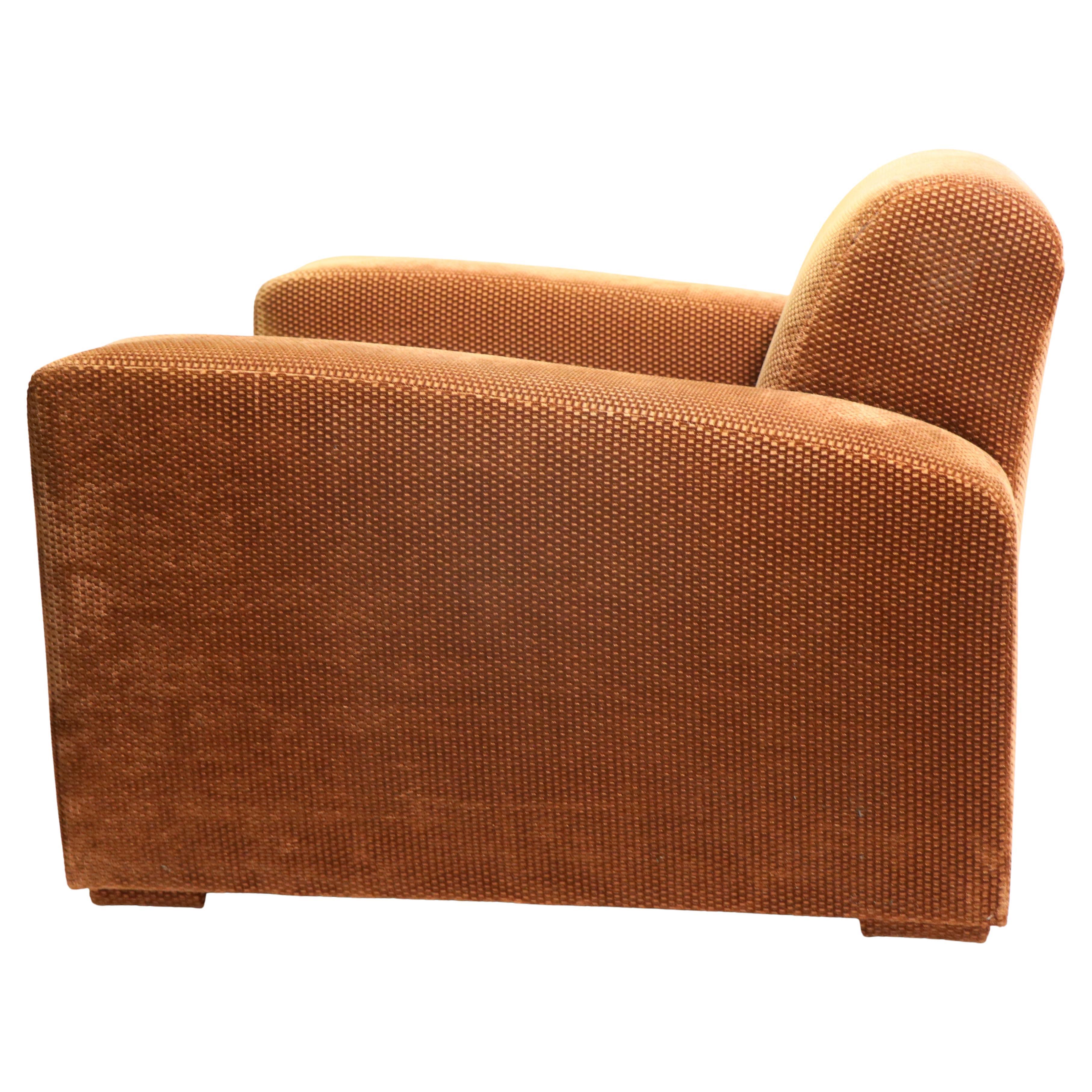 High style Art Moderne club, lounge chair in the style of the iconic Speed chair designed by Paul Frankl. This example is in very clean ready to use condition, it is voguish, chic, and comfortable. The exaggerated Art Deco lines still look modern