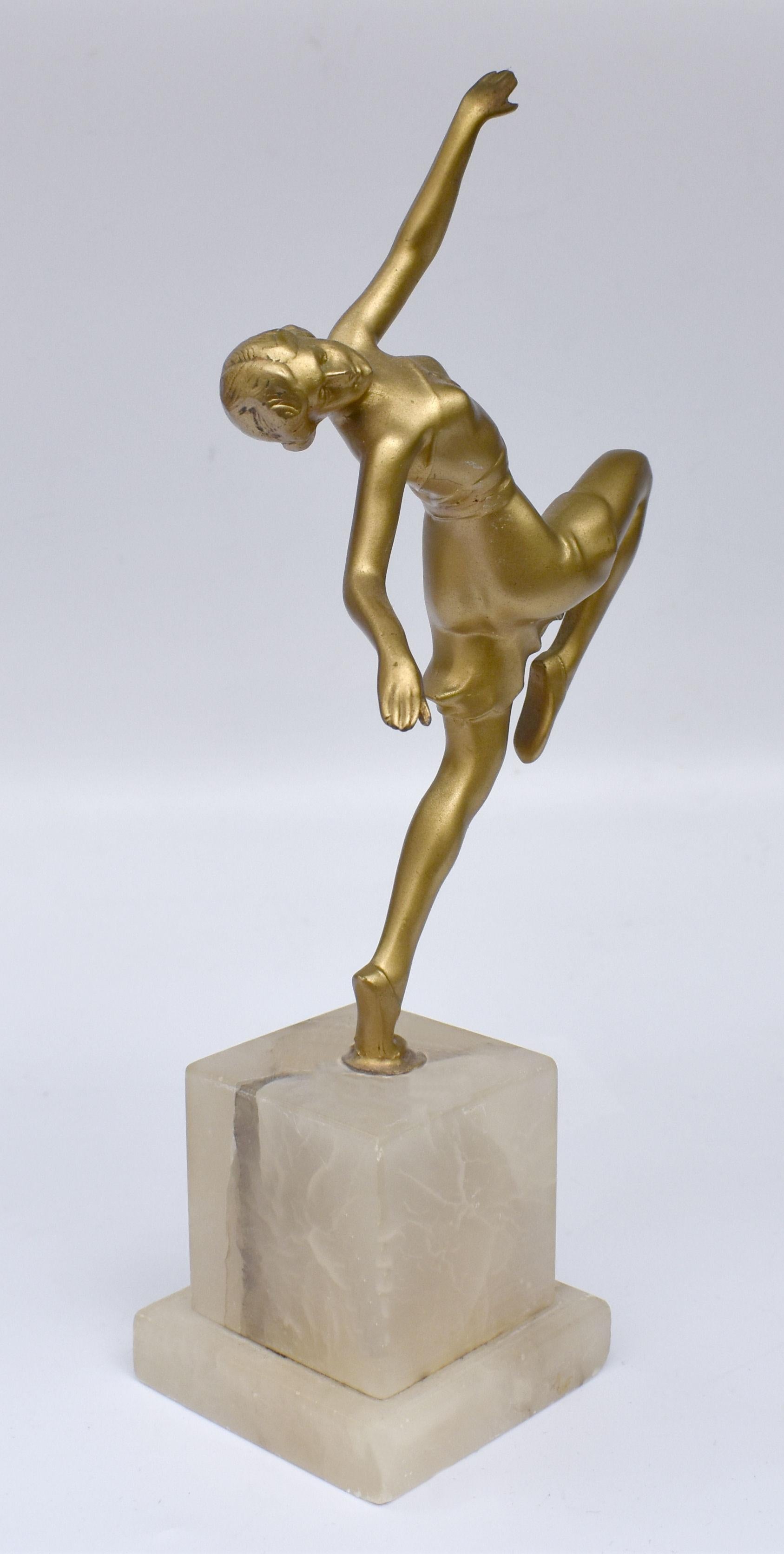 For your consideration is this wonderful 1930s Art Deco female dancer figure made from Spelter and gilded on top. She rests on an onyx base and stands 25 cm tall so a good height for display. Beautifully detailed and good condition, all fingers and