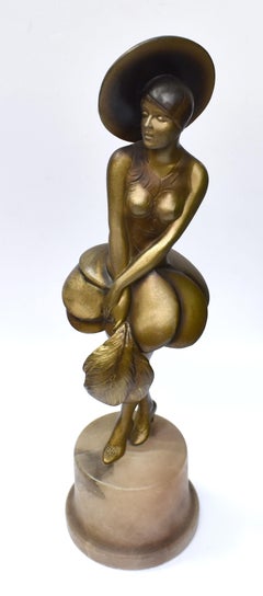 Figura in speltro Art Deco 'ragazza con ventaglio di piume', 1930 ca.