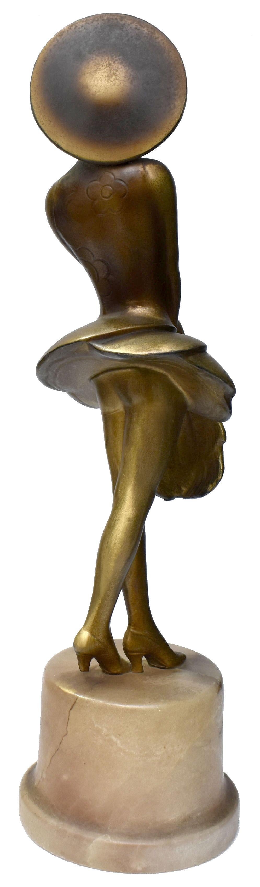 Early 20th Century Art Deco Spelter Figure 'girl with feather fan', c1930