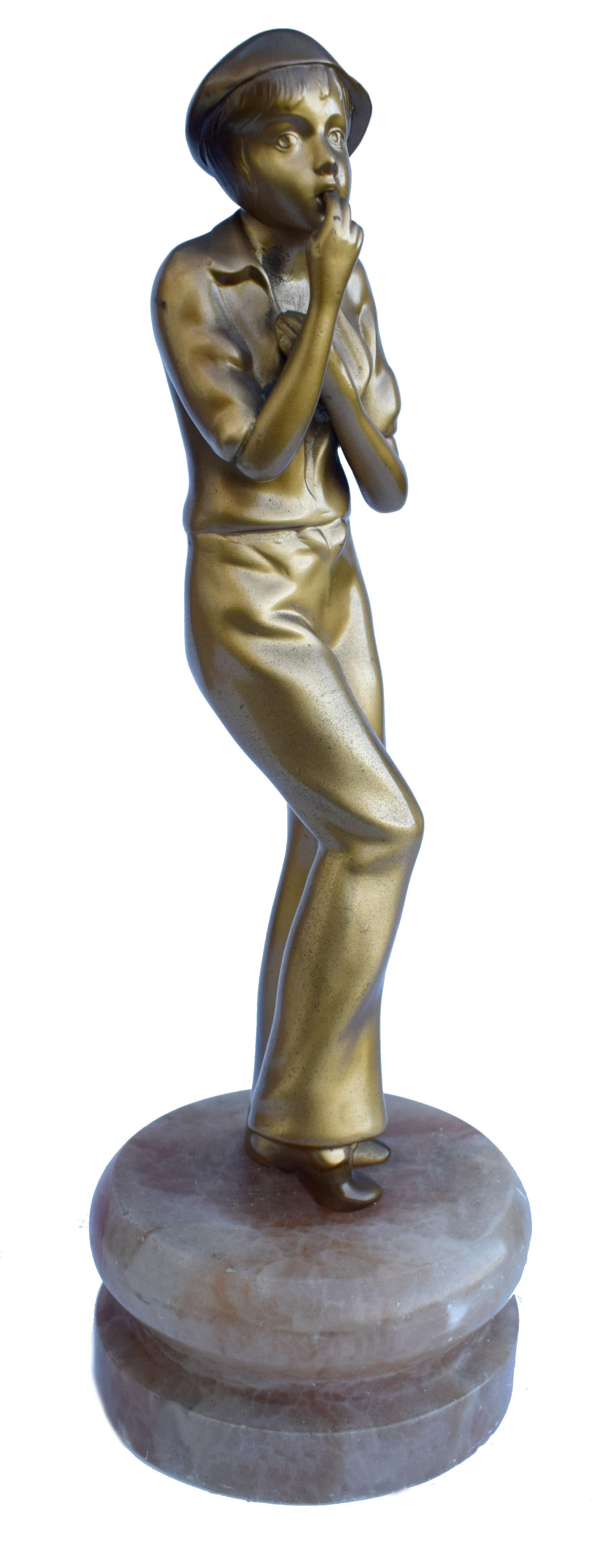 For your consideration is this original Art Deco spelter figure depicting a young women in fashion of the day, wearing slacks and top and what looks like a helmet / cloche hat. She's a substantial figure standing over 28 cm tall. She's in great