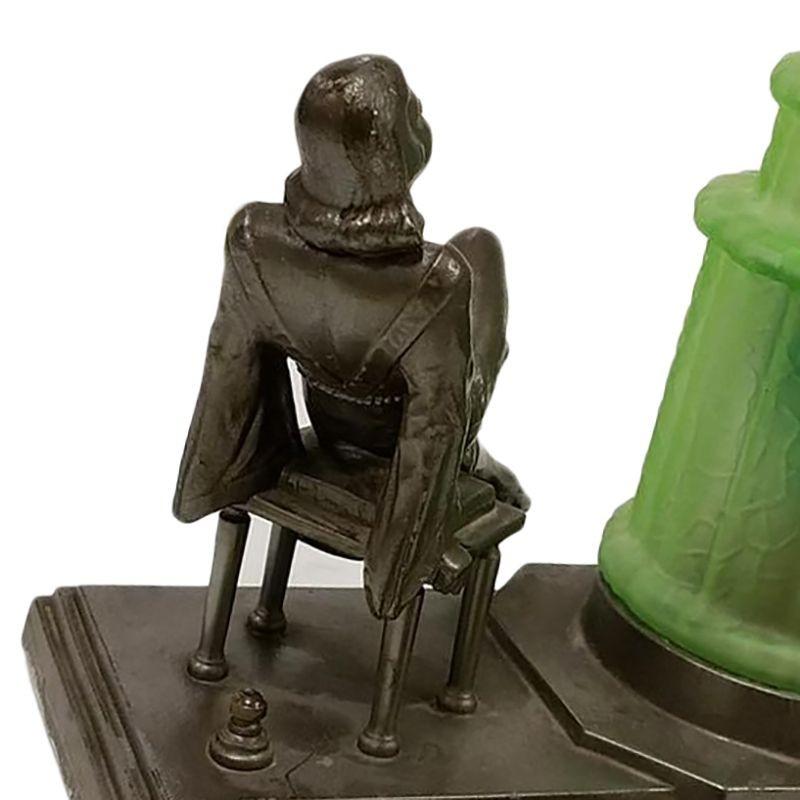 Mid-20th Century Art Deco Spelter Metal Lounging Women Lamp w/ Green Light Shape For Sale