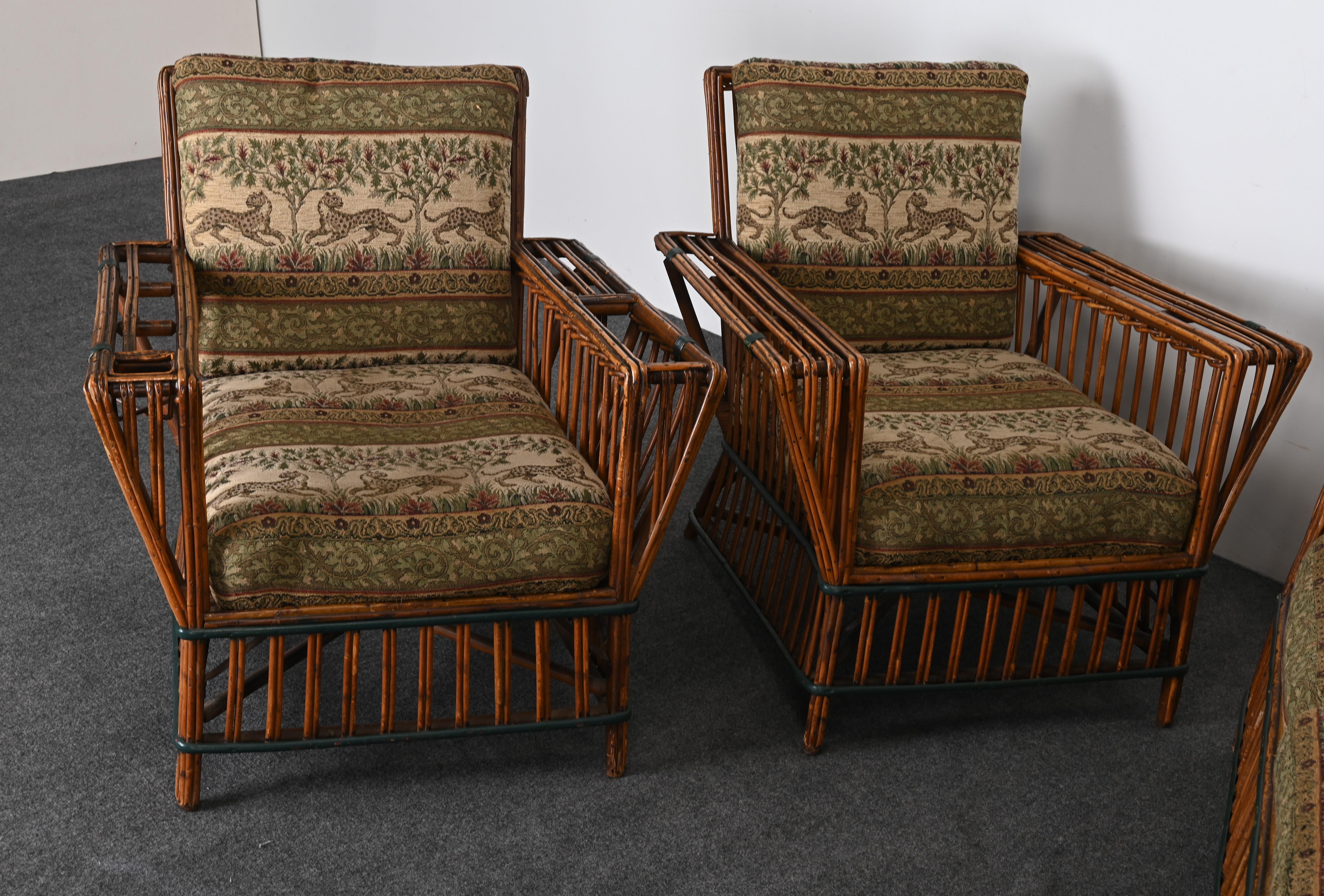 A handsome Art Deco Split Reed Rattan Sofa with a Pair of Armchairs and original cushions with vintage leopard-decorated fabric. You may want to reupholster. Some people call this Split Reed Ypsilanti Stick Wicker. The set is a wonderful ensemble
