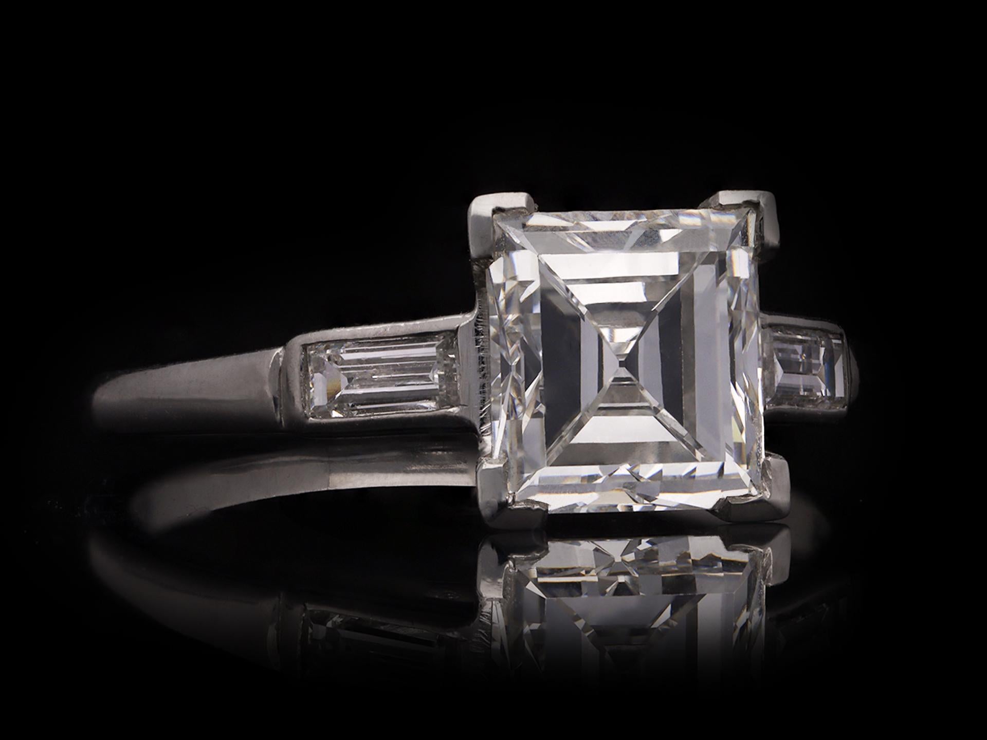 Women's Art Deco square step cut diamond ring, American, circa 1935. For Sale