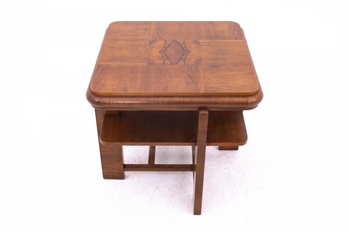 Art Deco table from the 1950s, Poland.

Furniture in very good condition, after professional renovation.

Dimensions: height 62 cm / width 68 cm / depth 68 cm