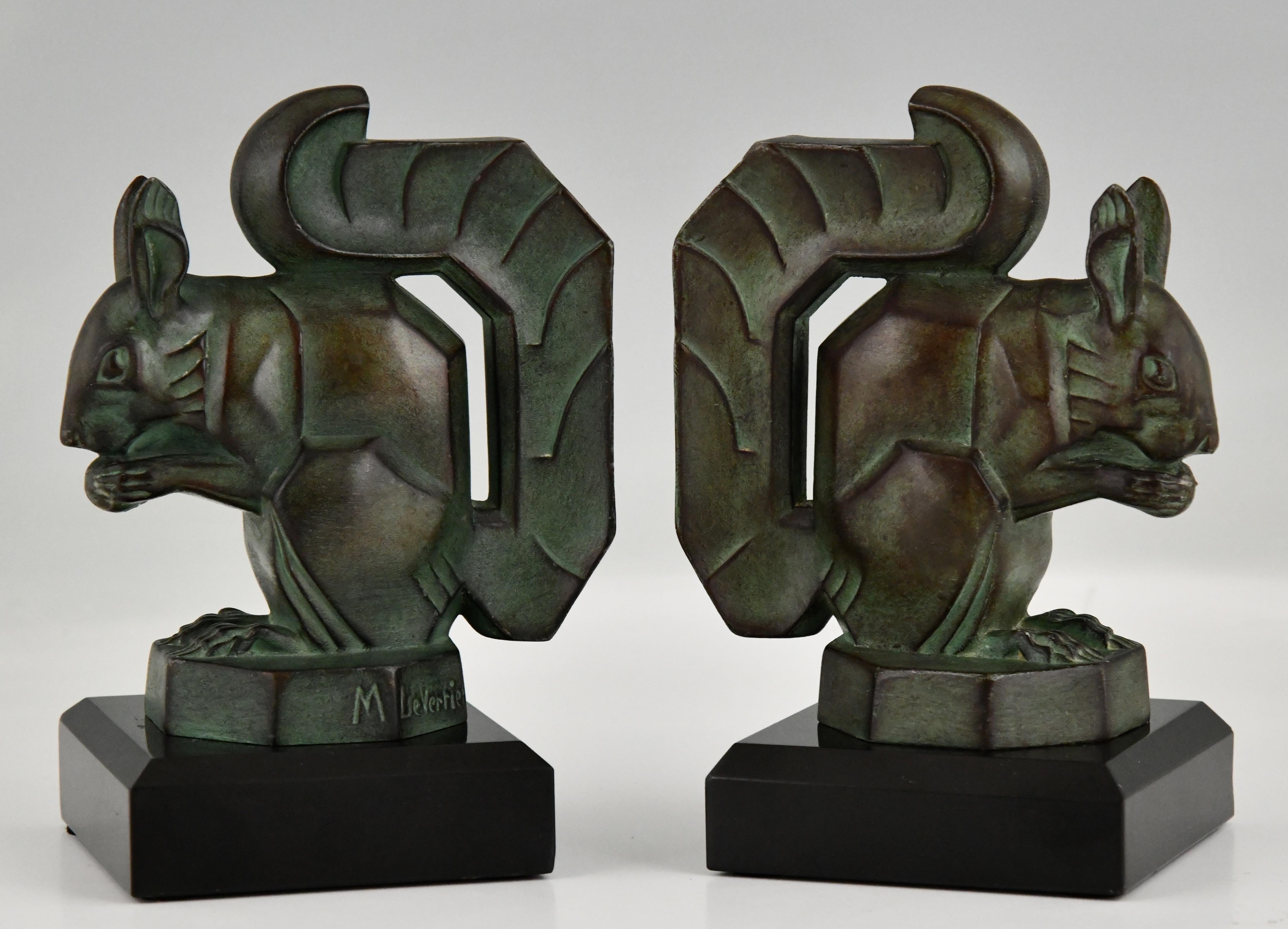 Art Deco squirrel bookends by Max Le Verrier
Art metal, dark green patina.
Belgian Black marble bases.
France 1930.
Literature:
Art Deco sculpture by Victor Arwas, Academy.
Bronzes, sculptors and founders by H. Berman, Abage.
Dictionnaire des
