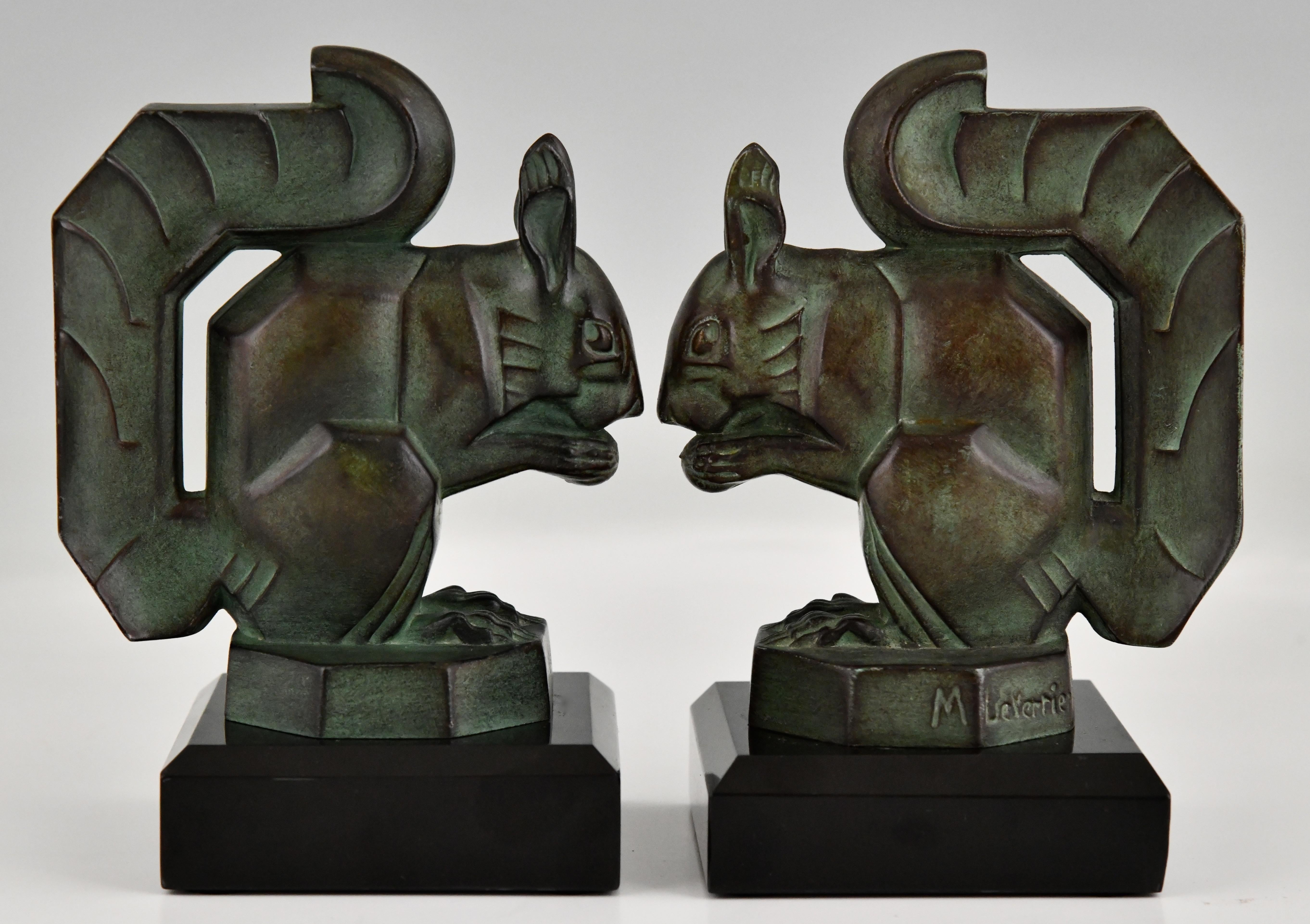 Patinated Art Deco squirrel bookends by Max Le Verrier France 1930