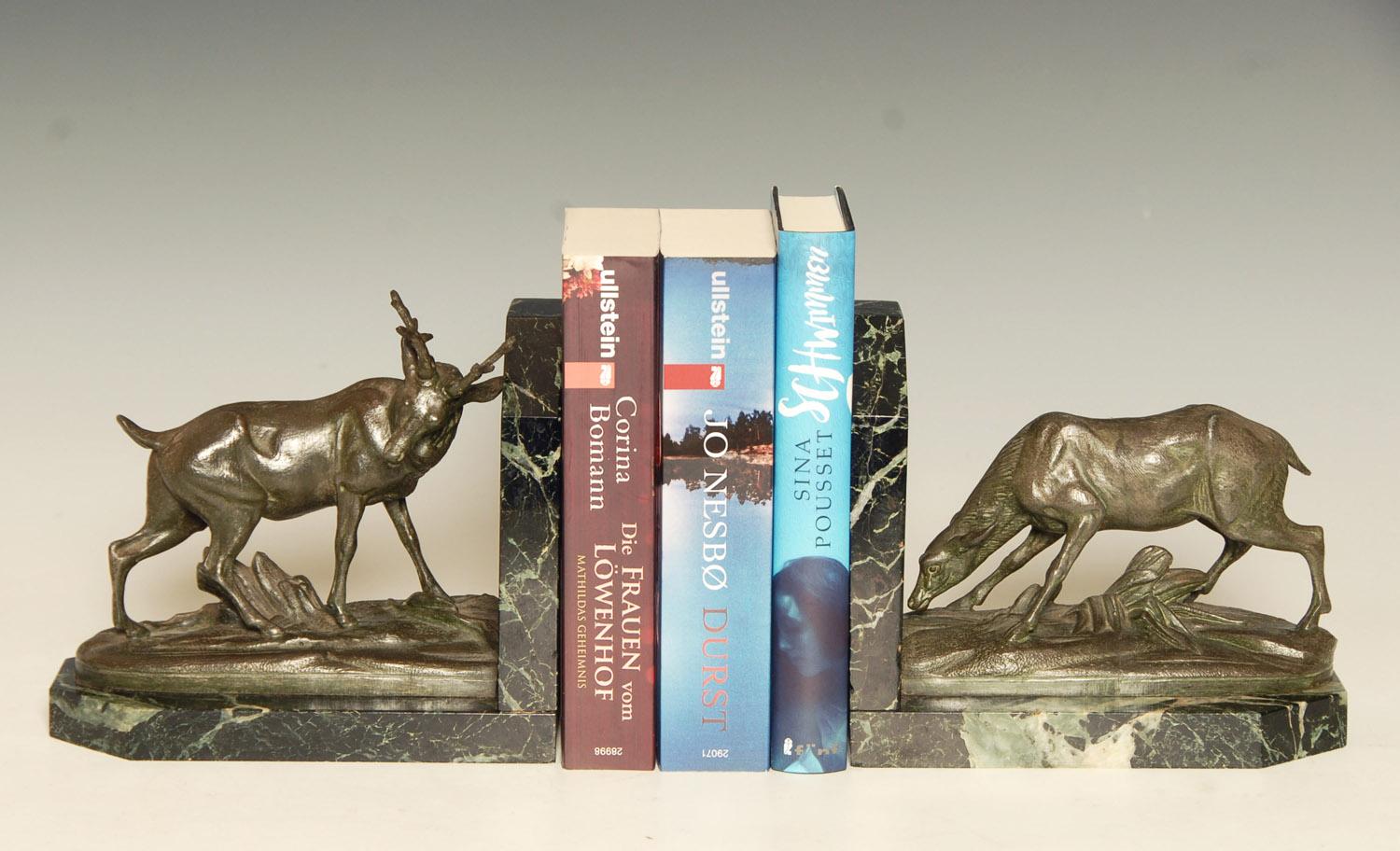 Fabulous pair of original Art Deco bookends of a stag and his mate, patinated metal on green variegated marble bases.

Large heavy pieces weighing around 5 lb or 2.25 kilos each.

Price includes complimentary shipping to anywhere in the world.