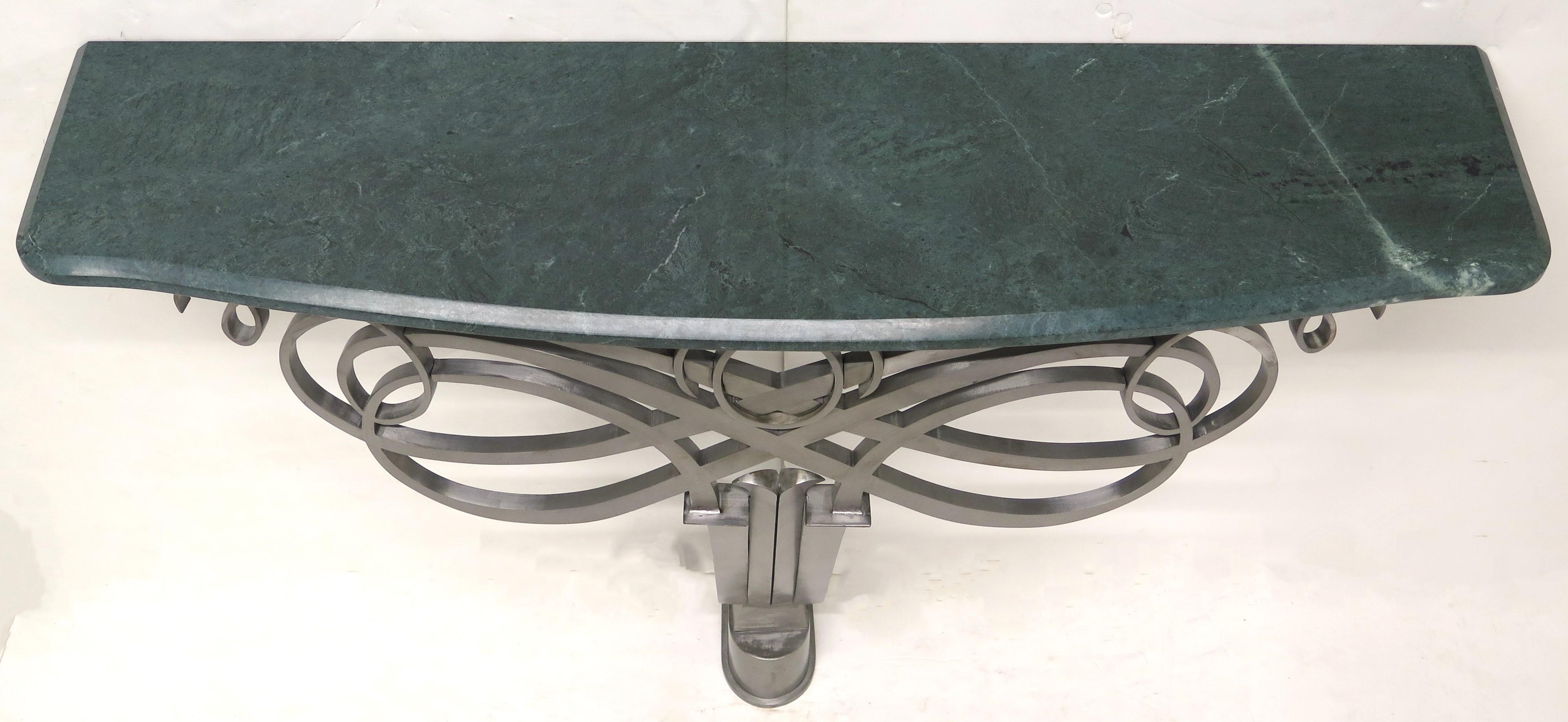 an elegant Art Deco solid stainless steel and green marble wall mounted console table, in the style of metalsmith Raymond Subes (French, 1893-1970). France, 20th century

38.25