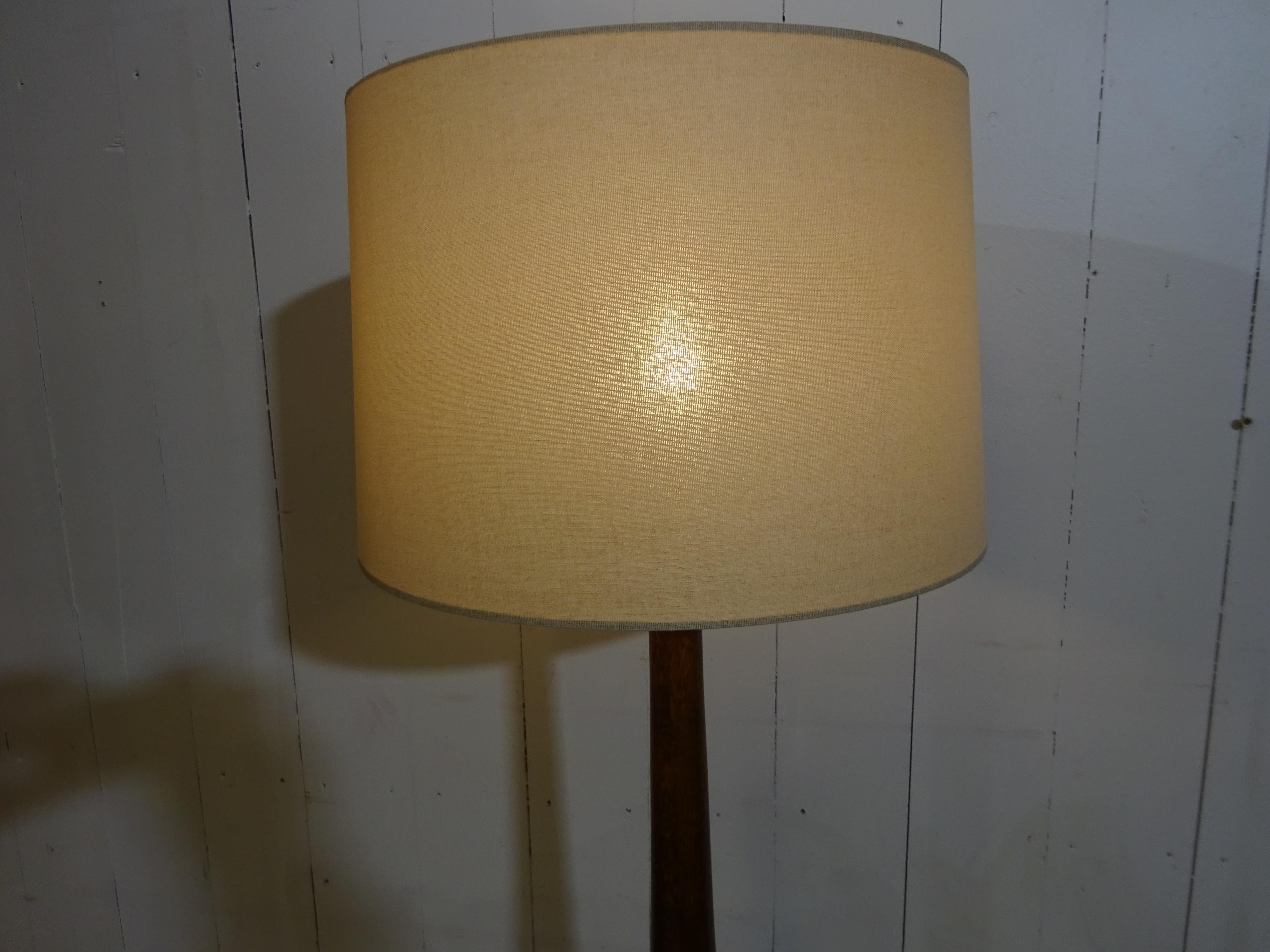 A design icon.

Original Art Deco standard lamp in lovely condition. Ideal for any room and a real statement piece. The quality and craftsmanship is something you just do not find today. Handcrafted the base is solid oak with lovely patina and