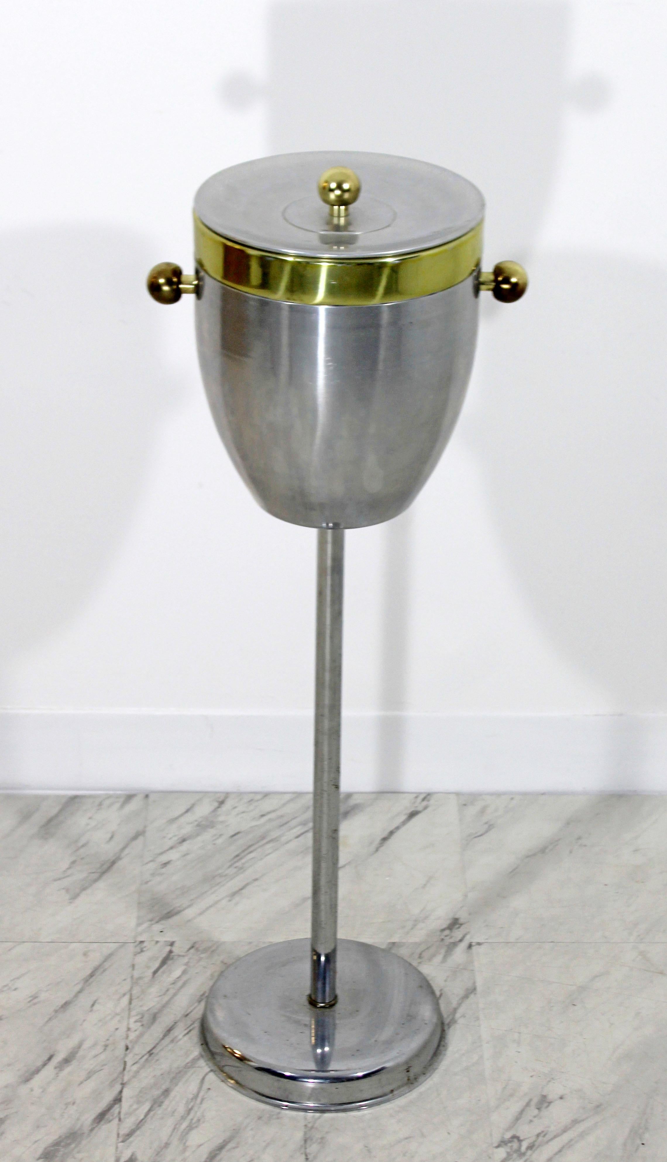 For your consideration is an original, Art Deco, chrome and brass, champagne or ice standing cooler. In excellent condition. The dimensions are 11